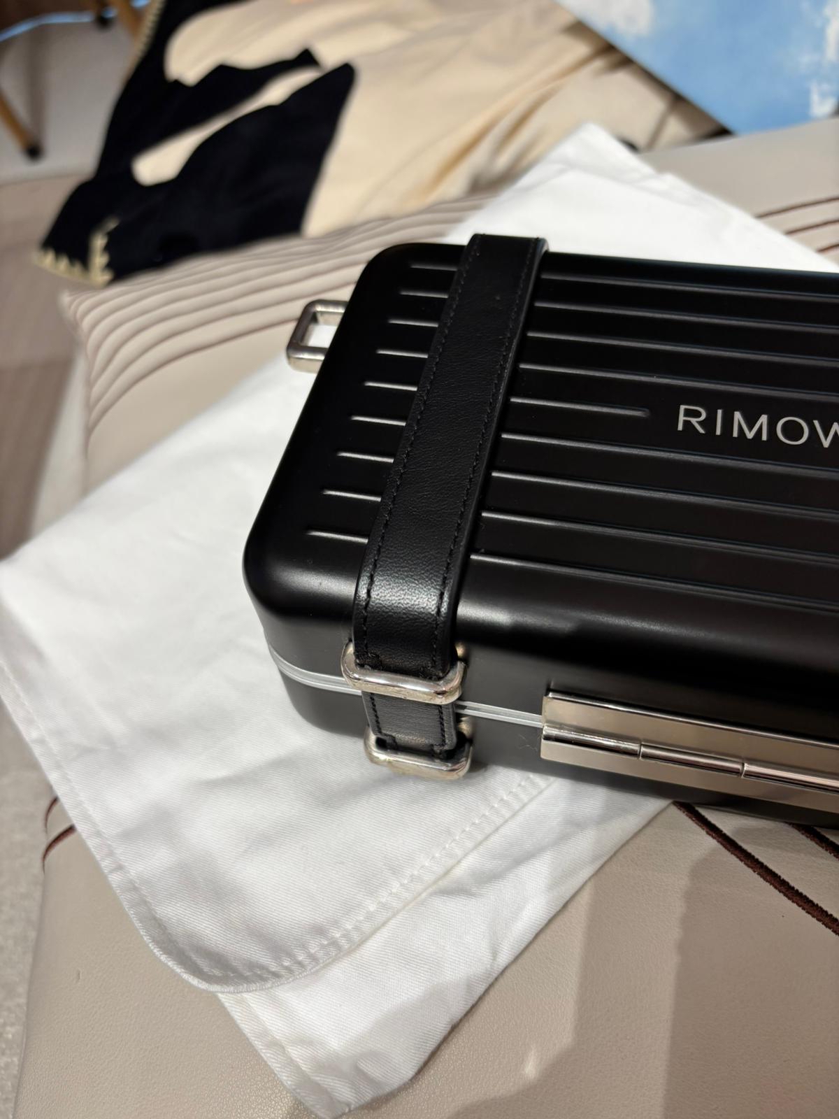 Dior x rimowa personal clutch on strap 100%Authentic ,98%new ✅tap card ✅strap✅dust bag ✅box