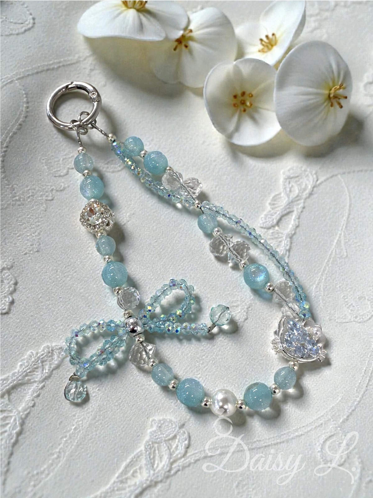 冰雪淺藍蝴蝶結水晶手機掛繩