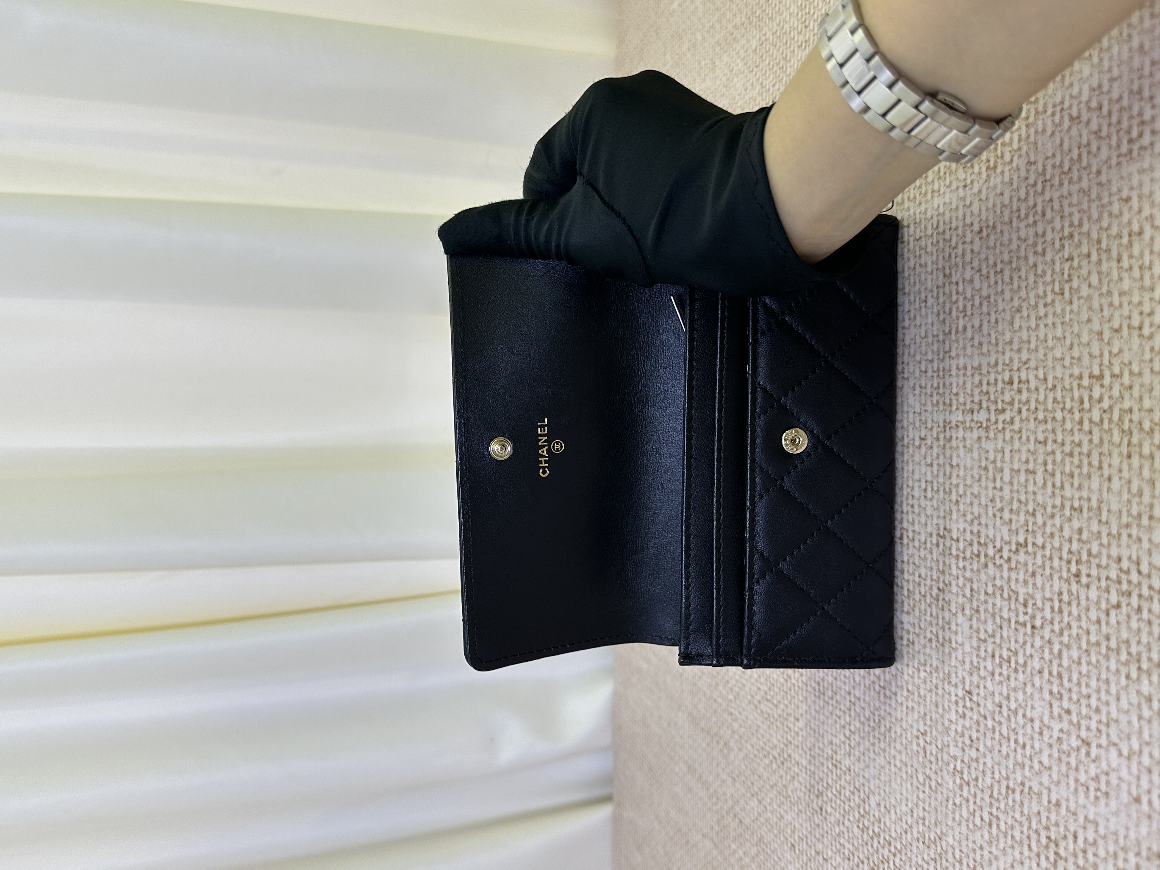 Pre owned Chanel black quilted flap wallet / Product Code: 26031024