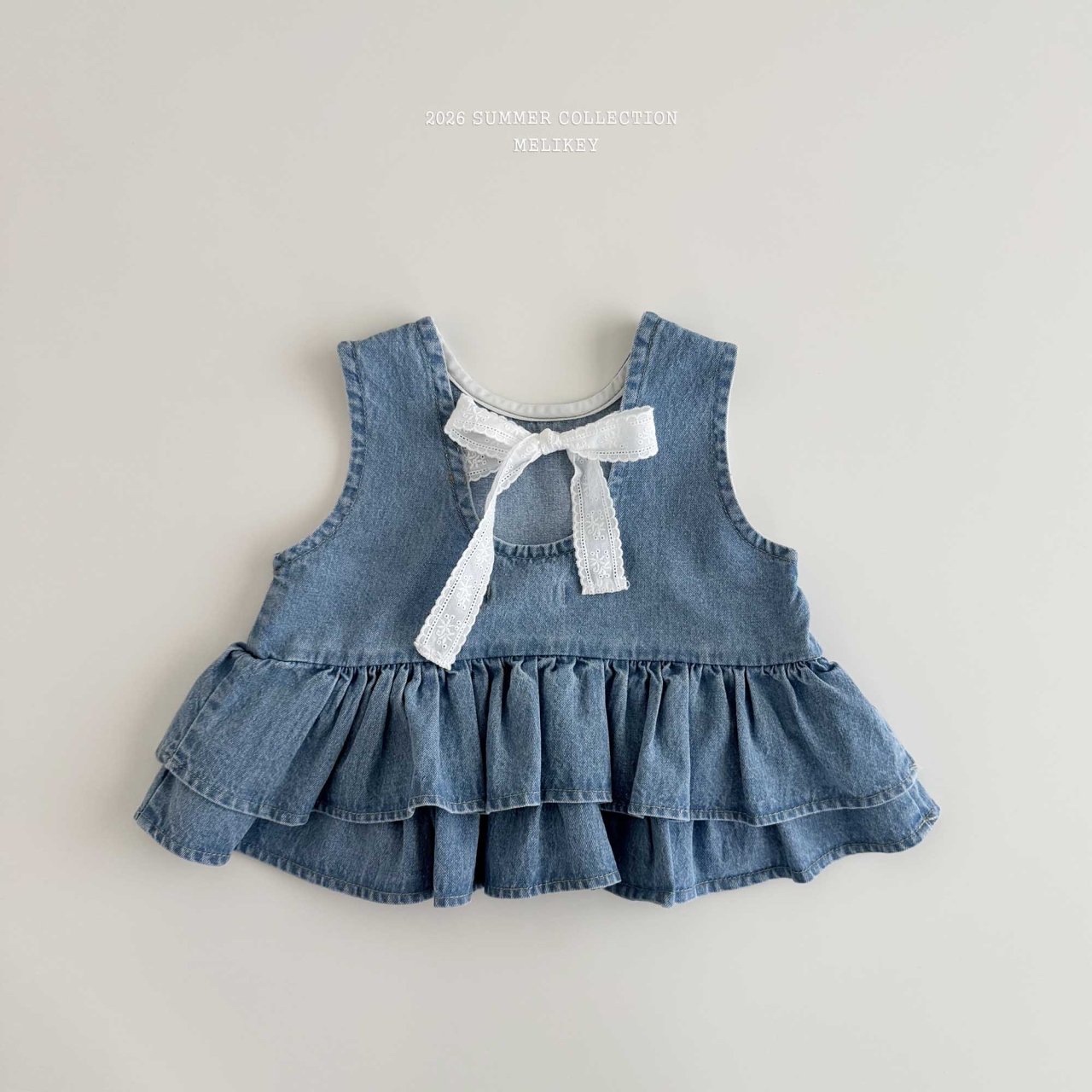 Ribbon Tiered Sleeveless Blouse