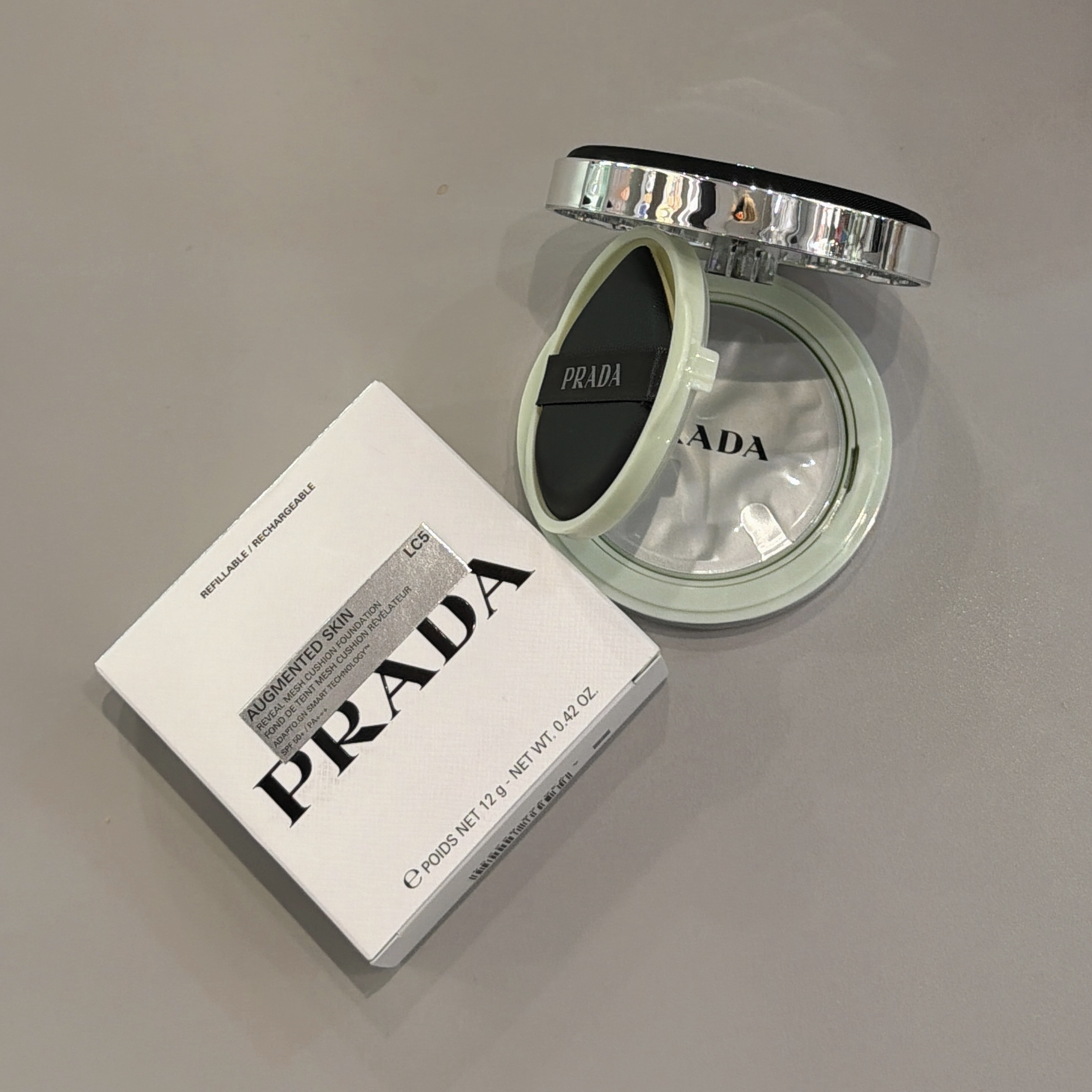 PRADA  BEAUTY REVEAL MESH CUSHION FOUNDATION 原光新肌氣墊粉底SPF+ PA+++  #LC5 (白皙色）12G