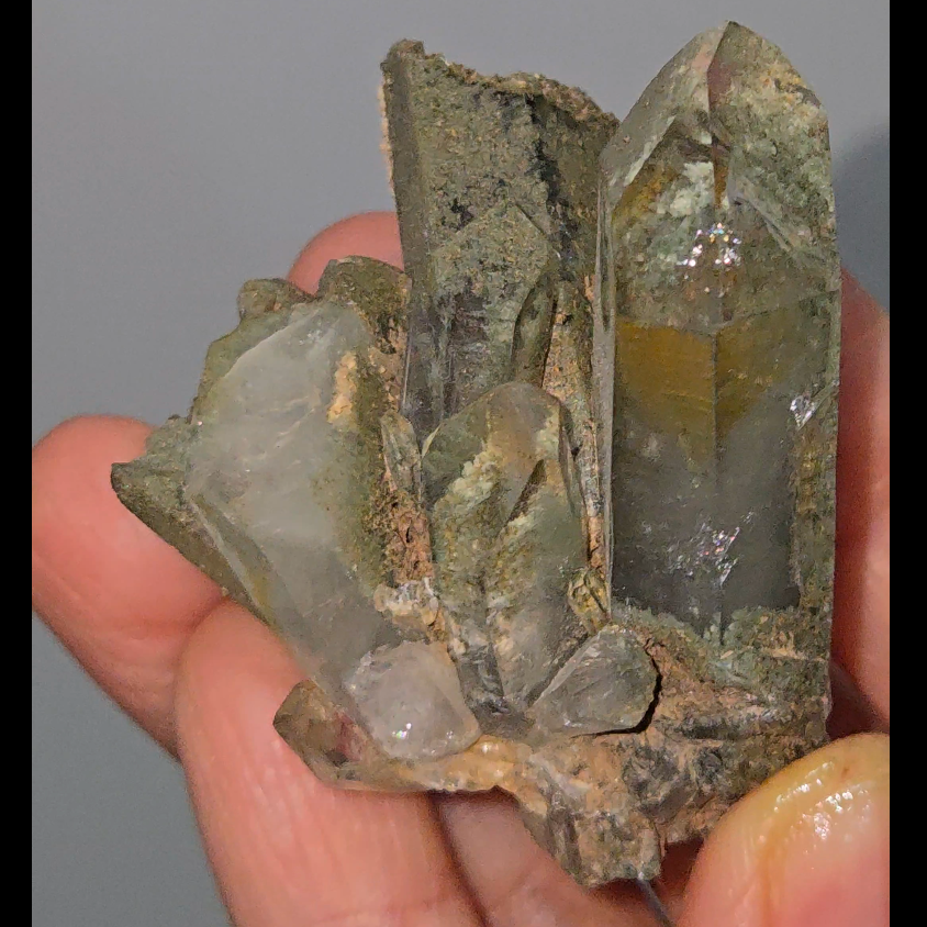 Epidote inclusion quartz cluster - CQ504