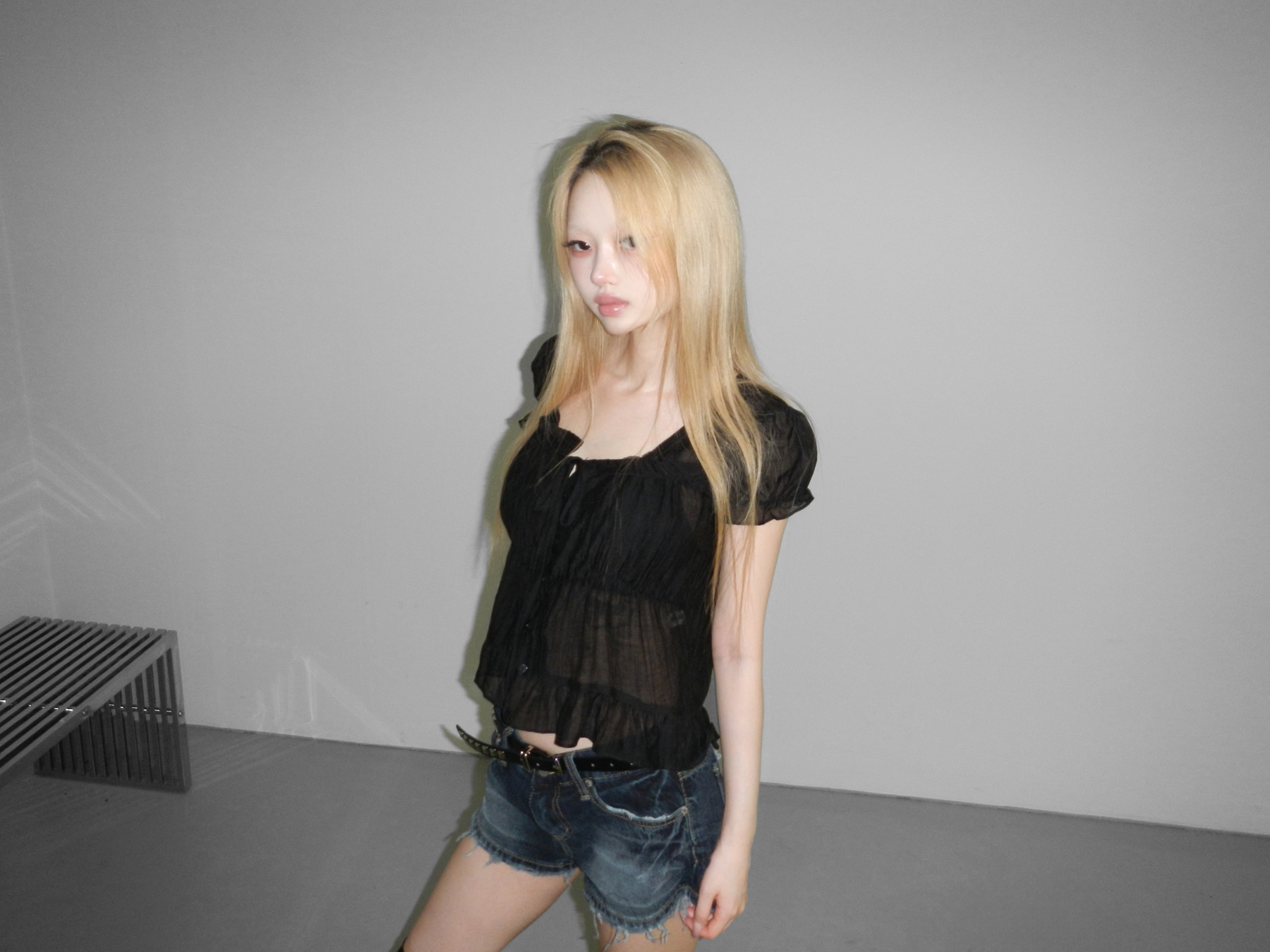 Low-Rise Distressed Denim Shorts