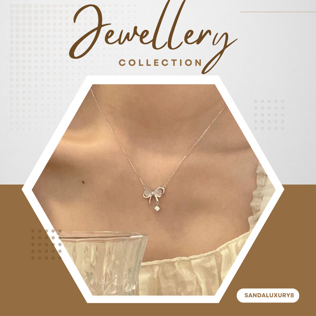 Silver Bow Pendant Necklace with Zirconia Stone Accent