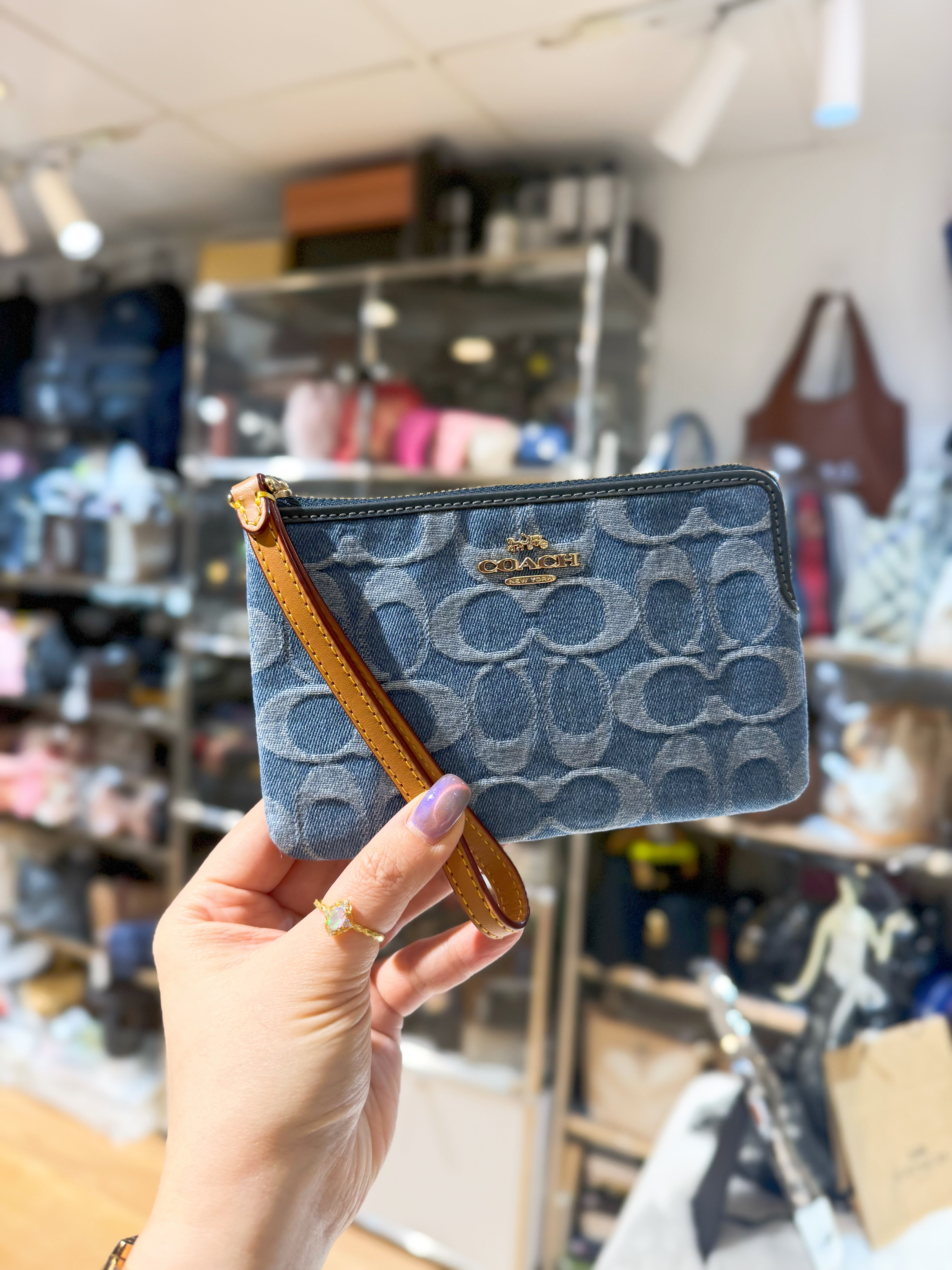 Coach wristlet light denim