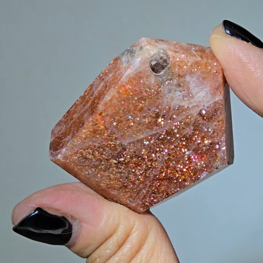Arusha sunstone with rainbow glitter, smoky quartz inclusions - SM61