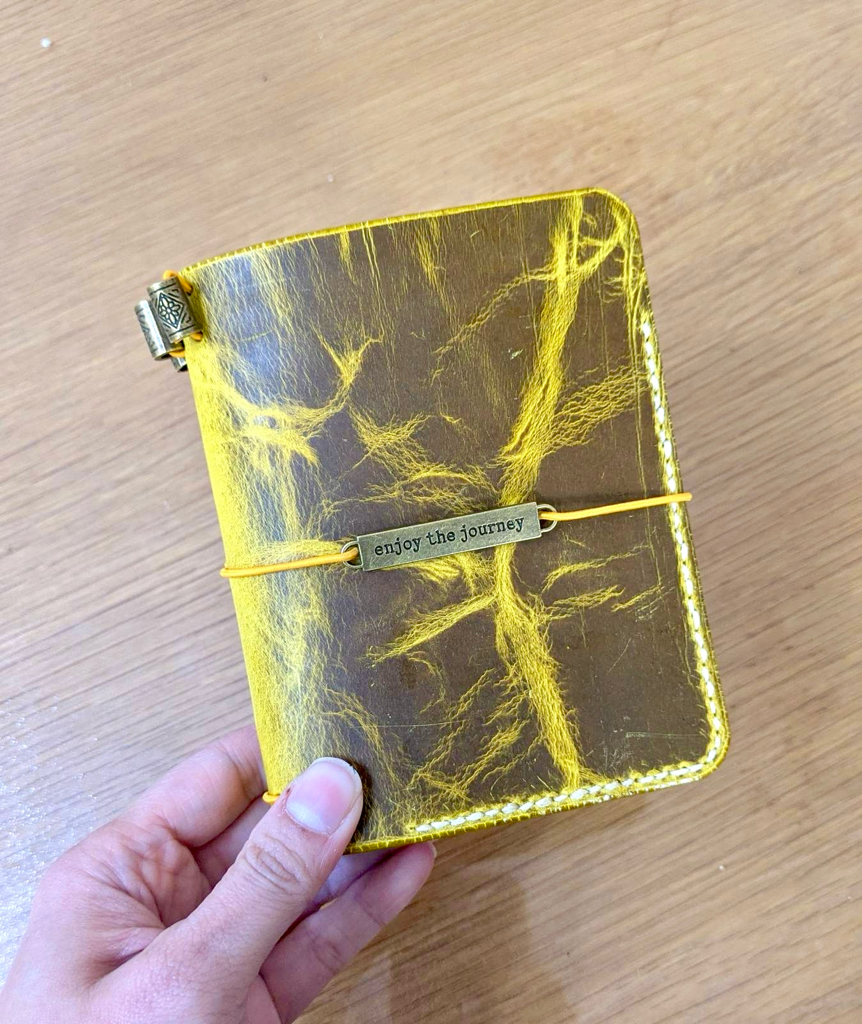 The Traveler’s Duo-Tone Hand-stitched Journal 