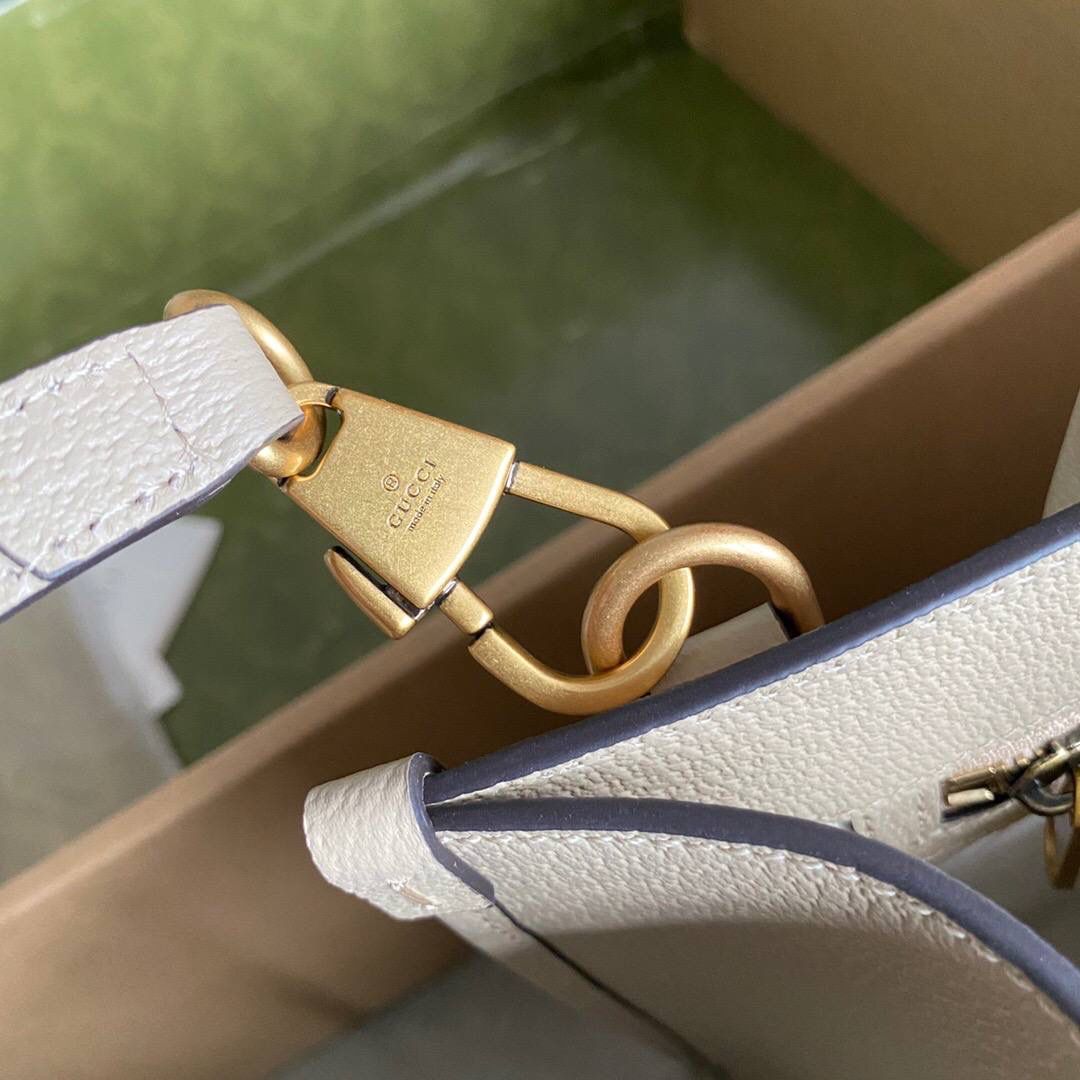 👜独家特级正品 g 659983 这款结构挺括的小号托特包采用gg supreme帆布制作，搭配燕麦色皮革滚边， 提供顶部提手和肩带双重携带选择。米色白色gg supreme帆布，环保材料，饰燕麦色皮革滚边❤️