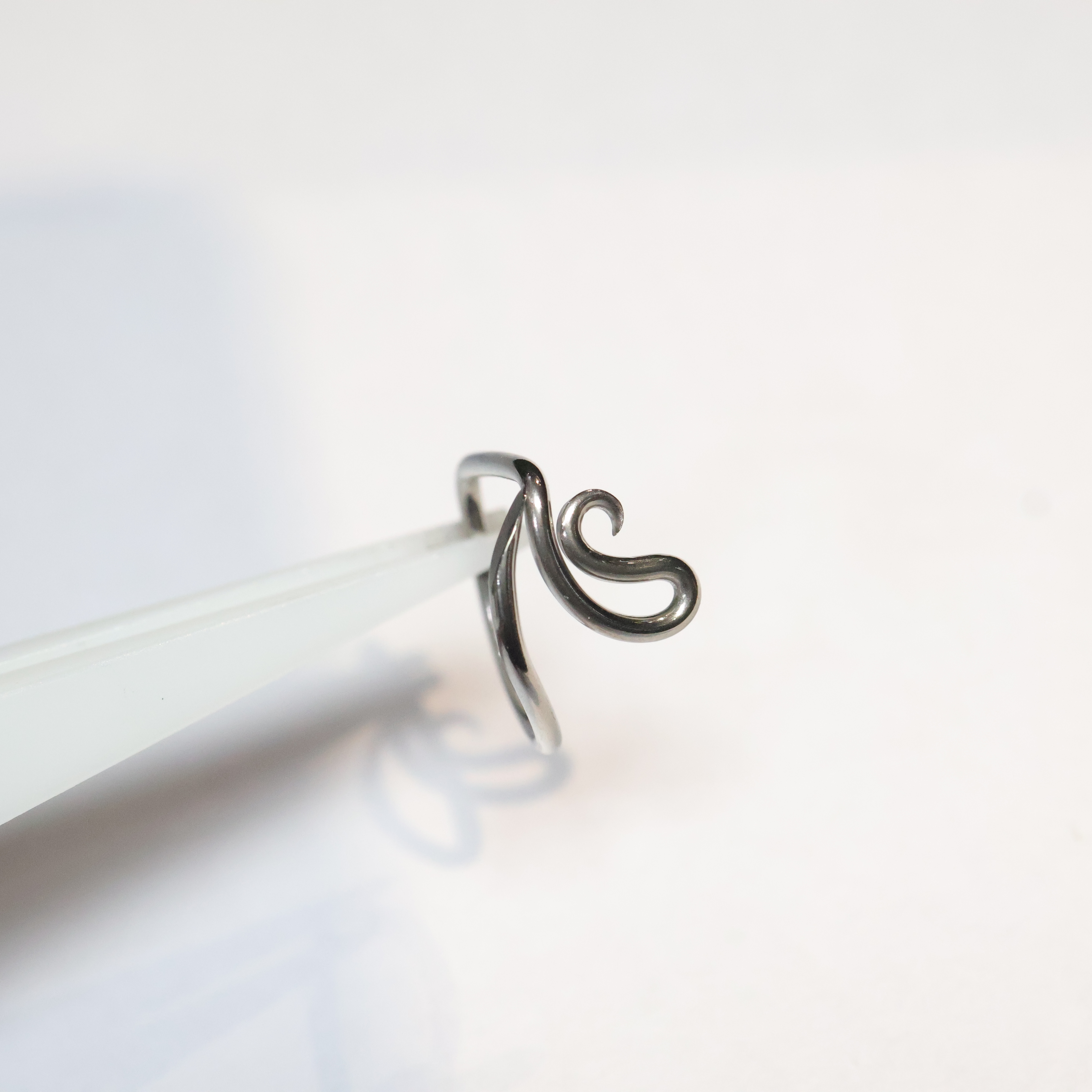 Capella	(Nostril, Tragus, & Forward Helix)