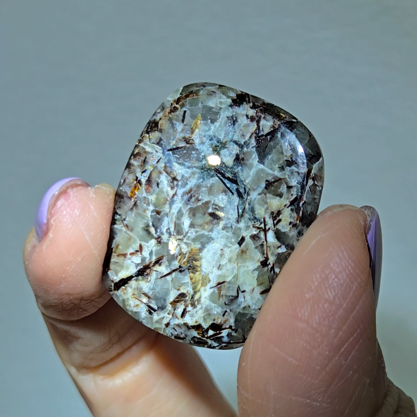 Astrophyllite cabochon with golden-bronze metallic inclusions - AST20