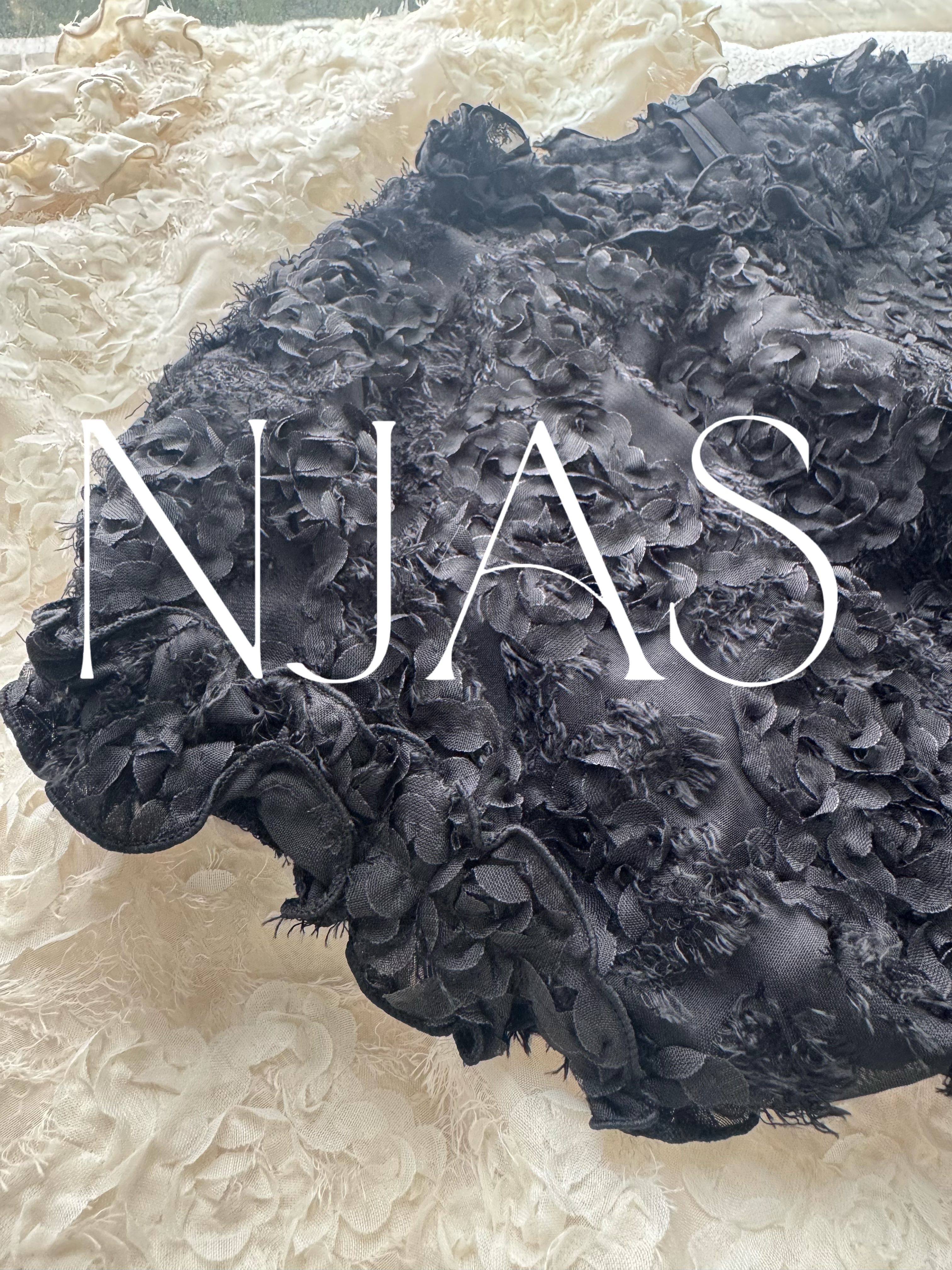 Feminine textured flower blouse