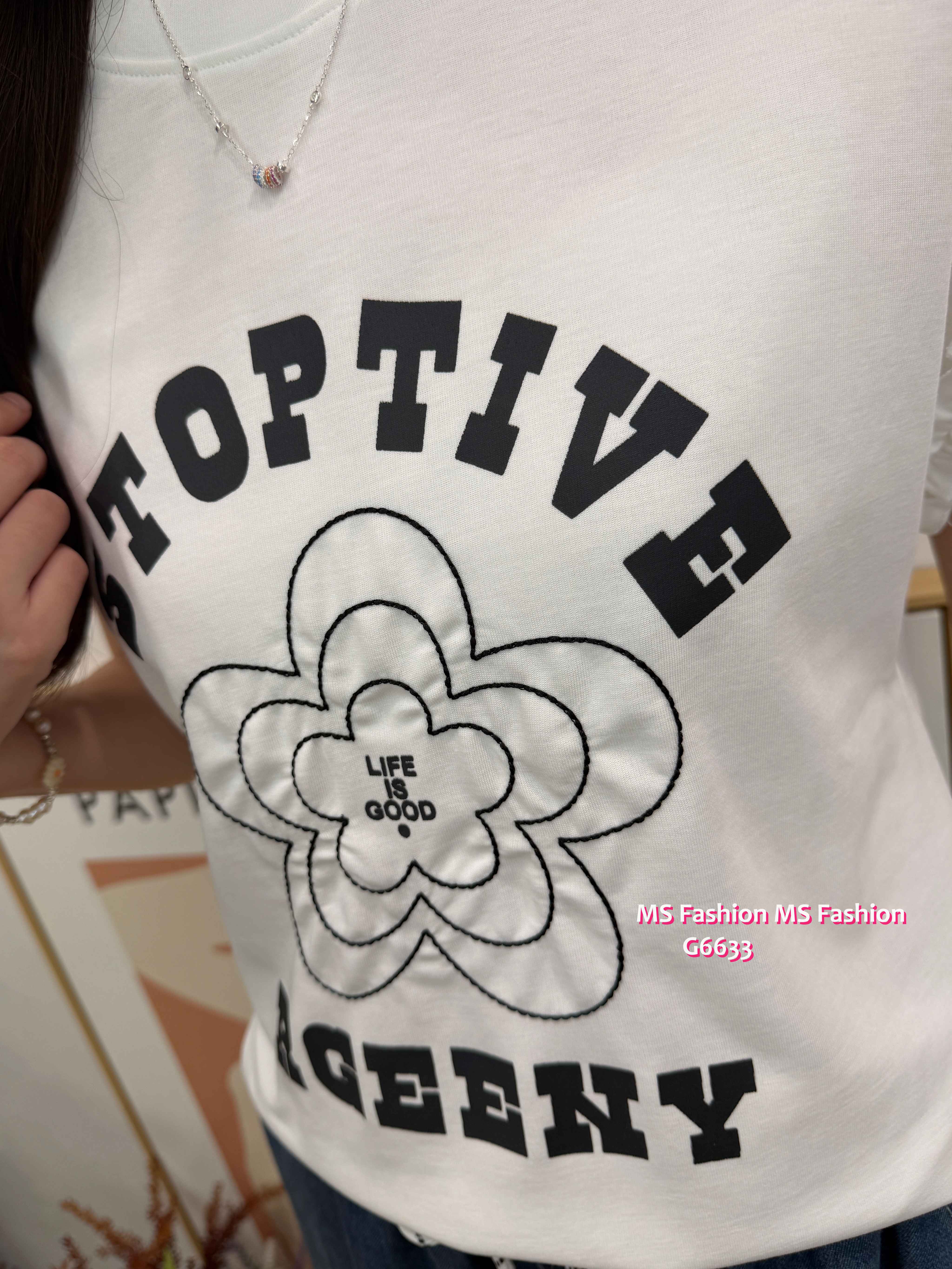 G6633 花花字母ruffle袖top