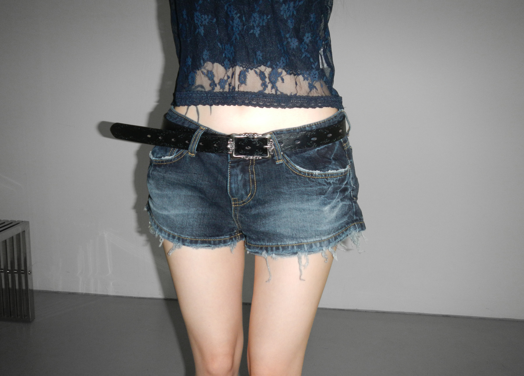 Low-Rise Distressed Denim Shorts
