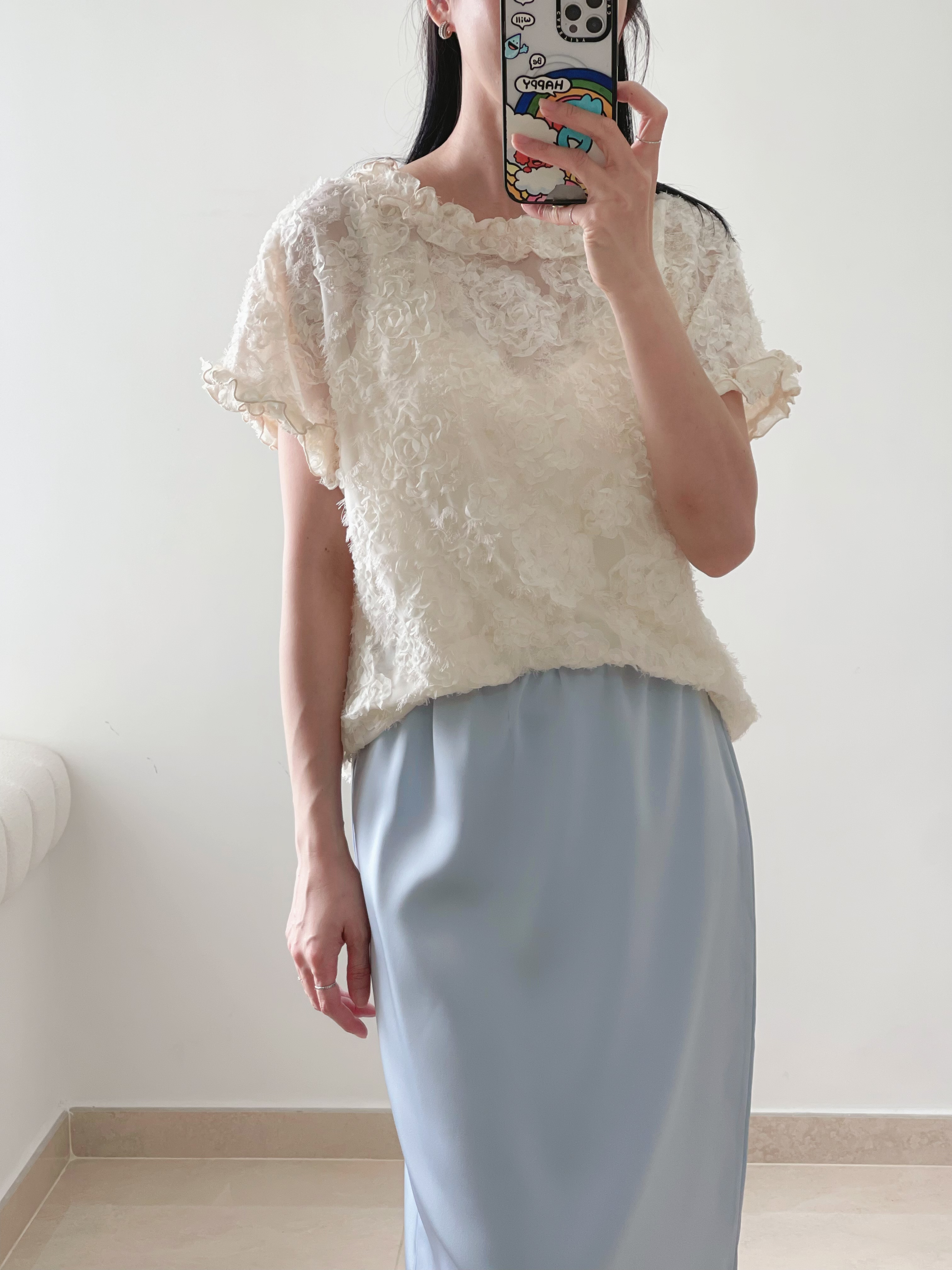 Feminine textured flower blouse