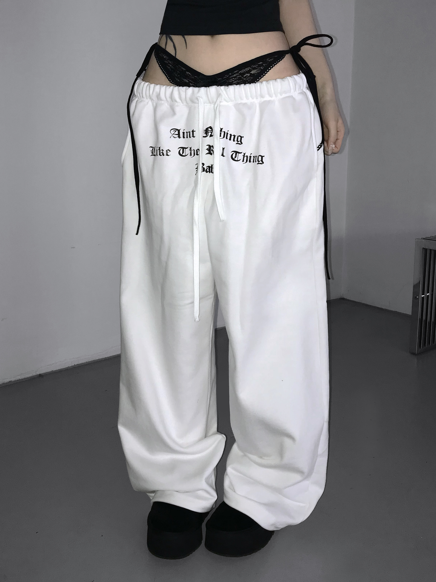 Layered Lace Waist Graphic Wide Leg Pants
