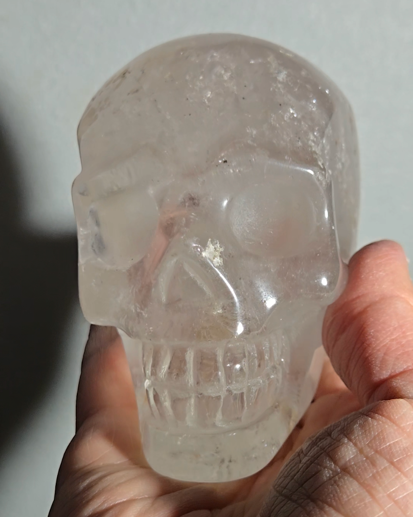 Clear quartz skull with rainbows - CQ49