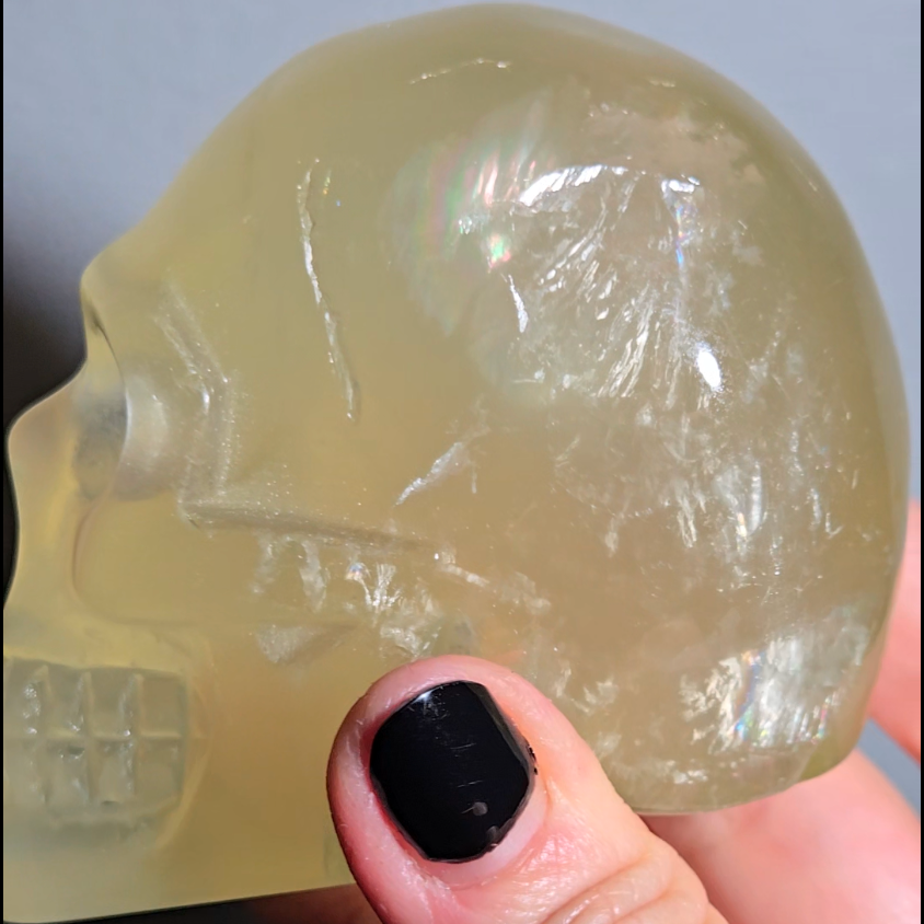 Citrine skull with rainbows and multiple star flash asterism - C59