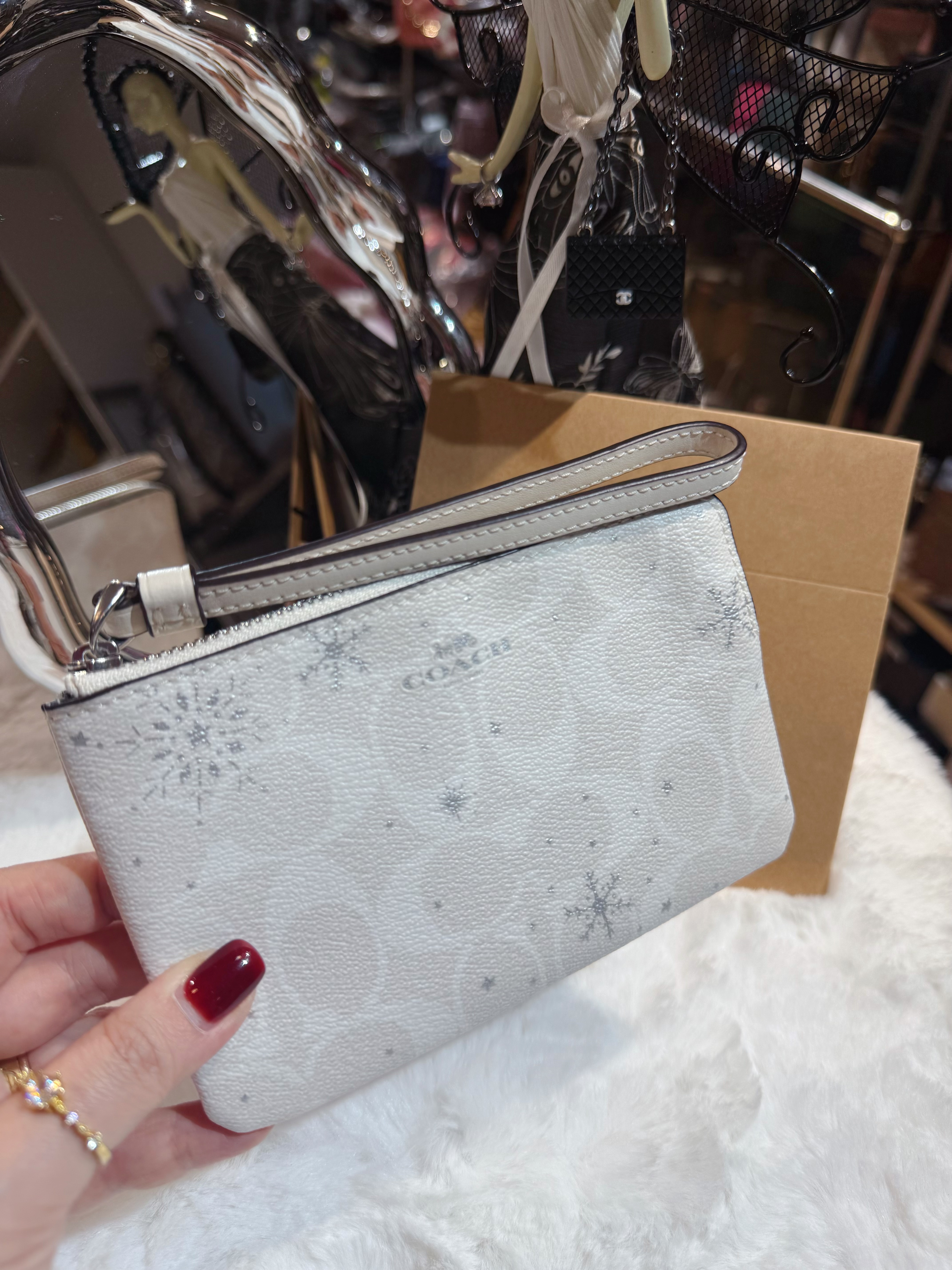 Coach wristlet grey/m/snow