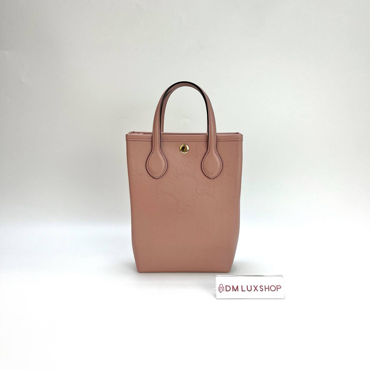 Gucci Pink GG Embossed Vertical Mini Tote