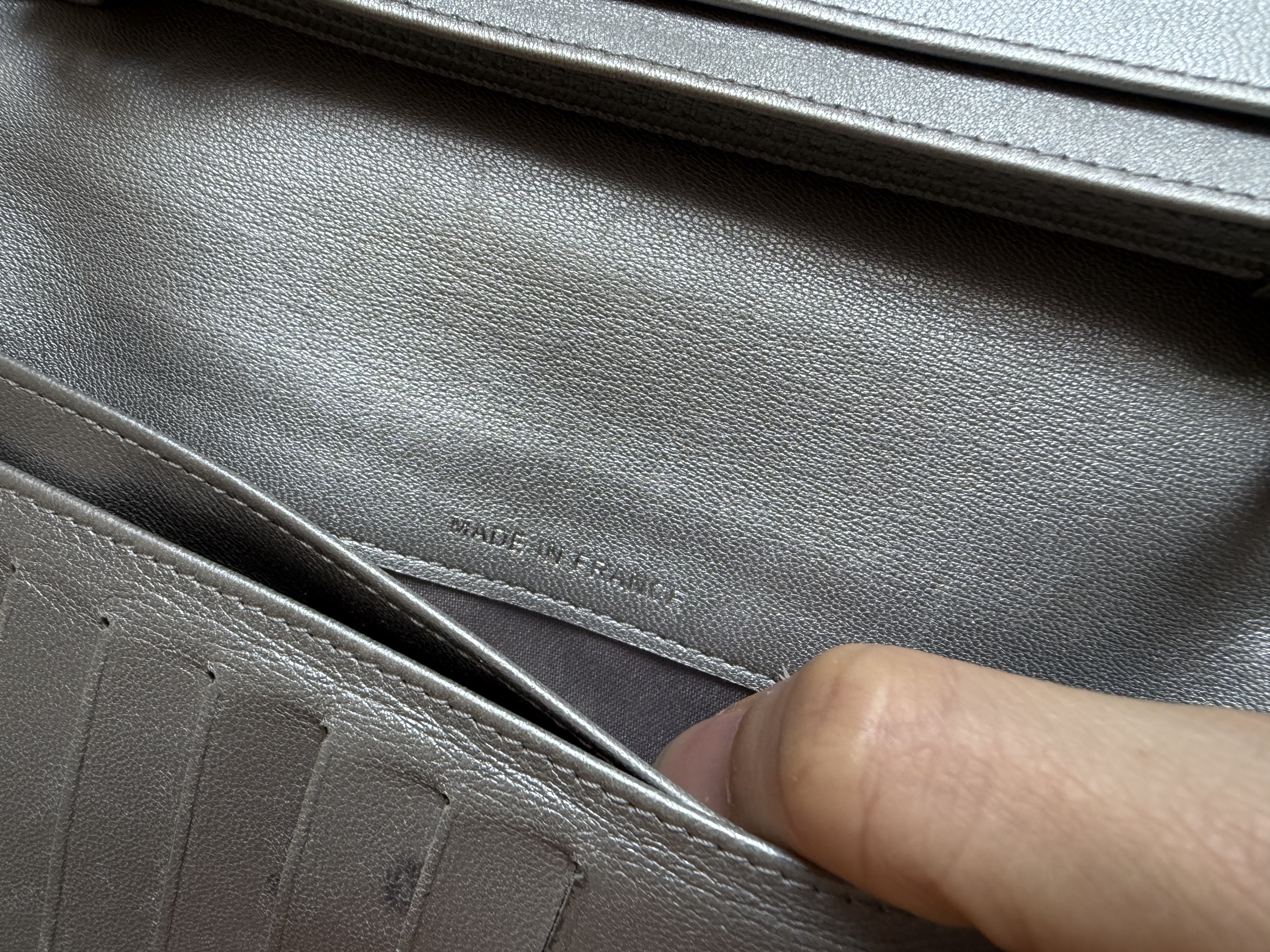 Chanel black leather camellia wallet