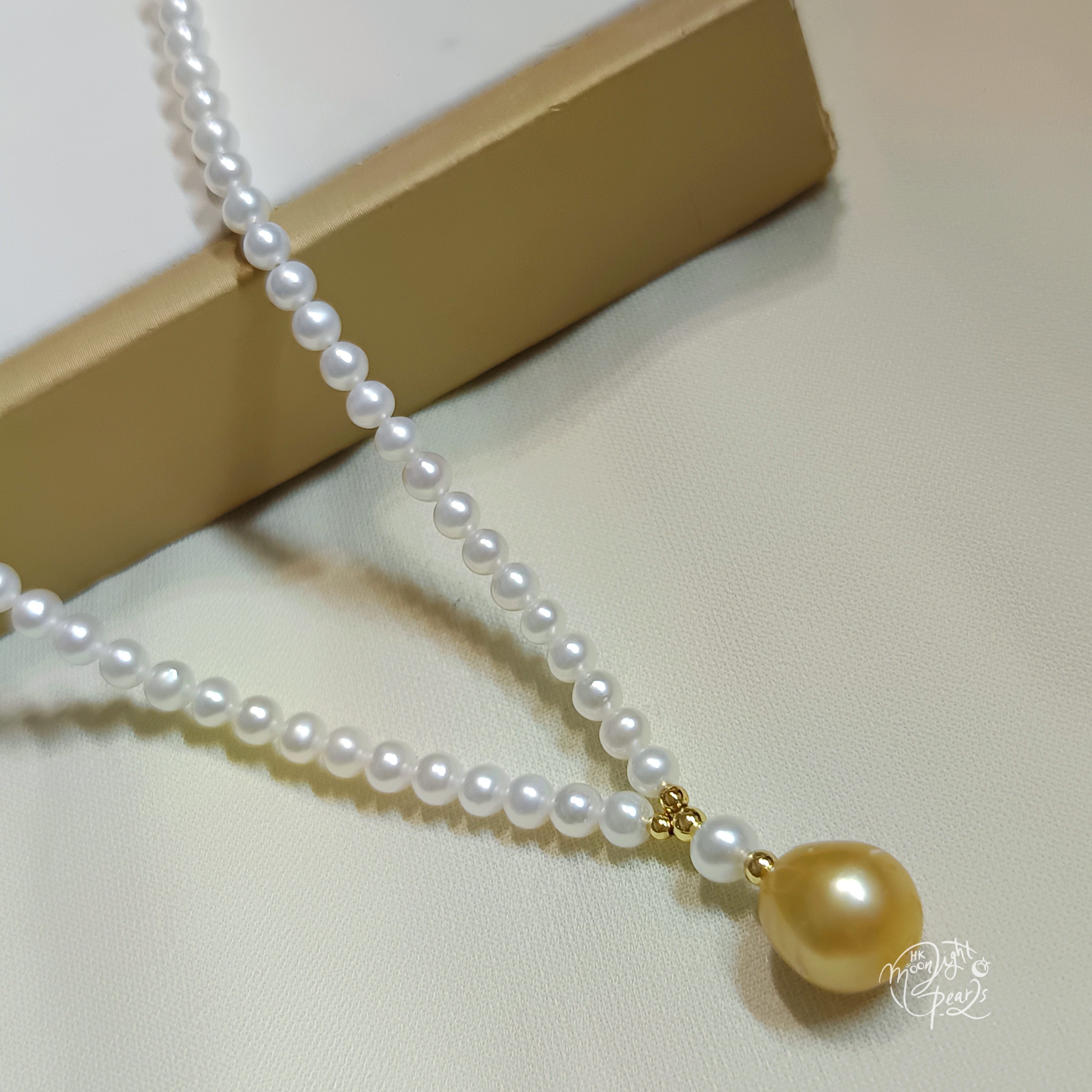 近正圓強光淡水AK白細胞珍珠+水滴南洋濃金海水珍珠注金尾鍊扣項鍊