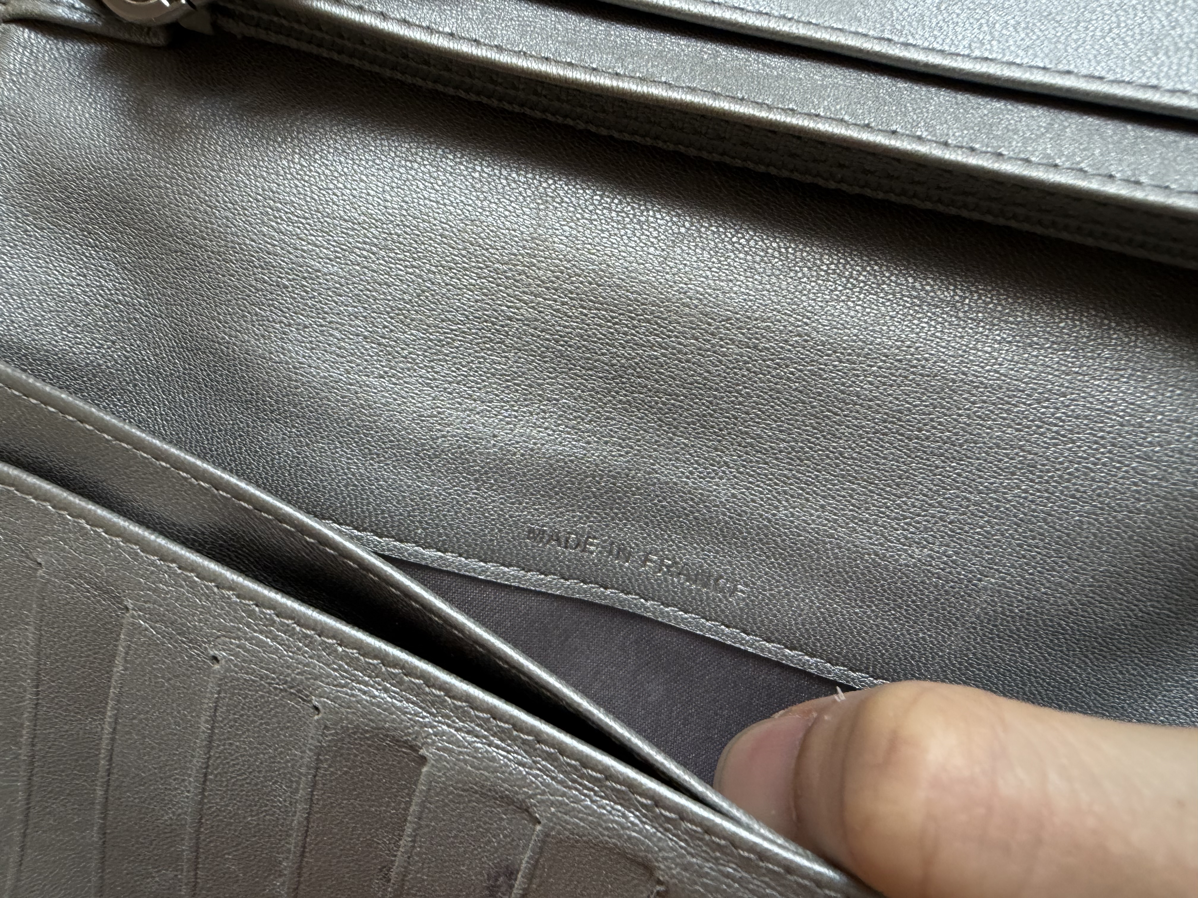 Chanel black leather camellia wallet