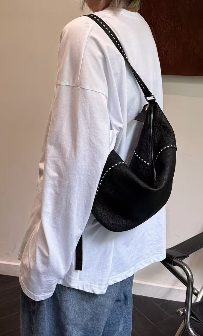 明線軟牛皮包包