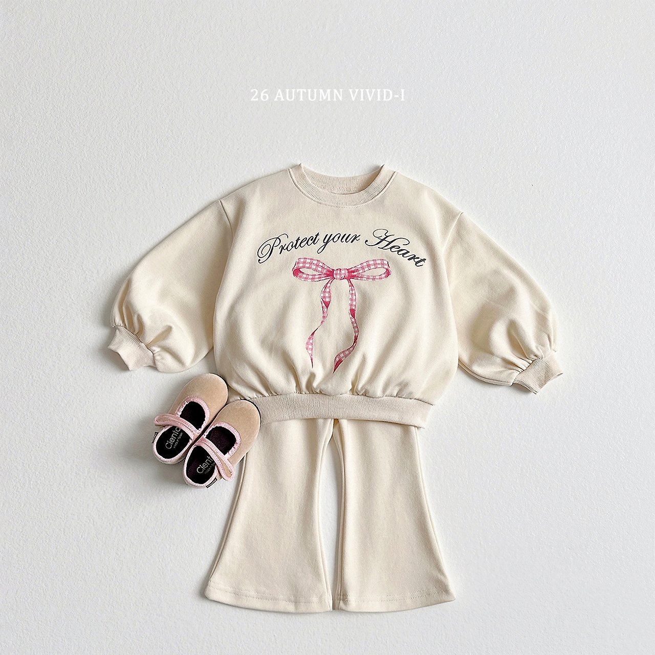 Vivid | Pink ribbon up and down