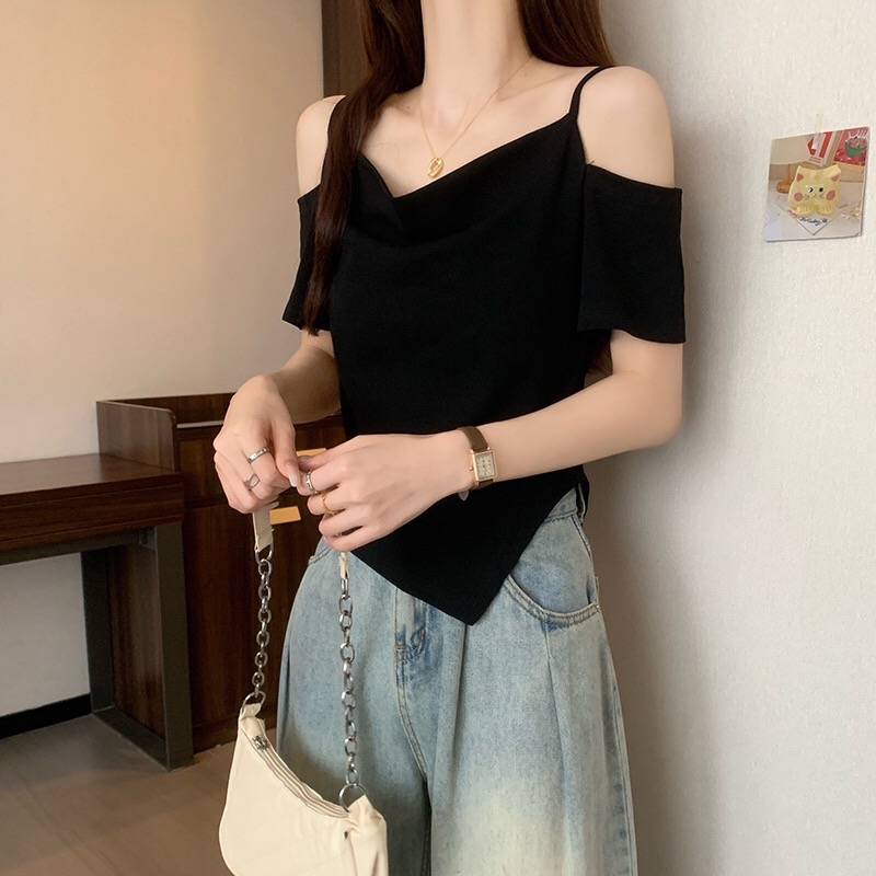 B177(16293) 韩版纯欲风显瘦一字双吊带露肩下摆斜开角黑上衣 