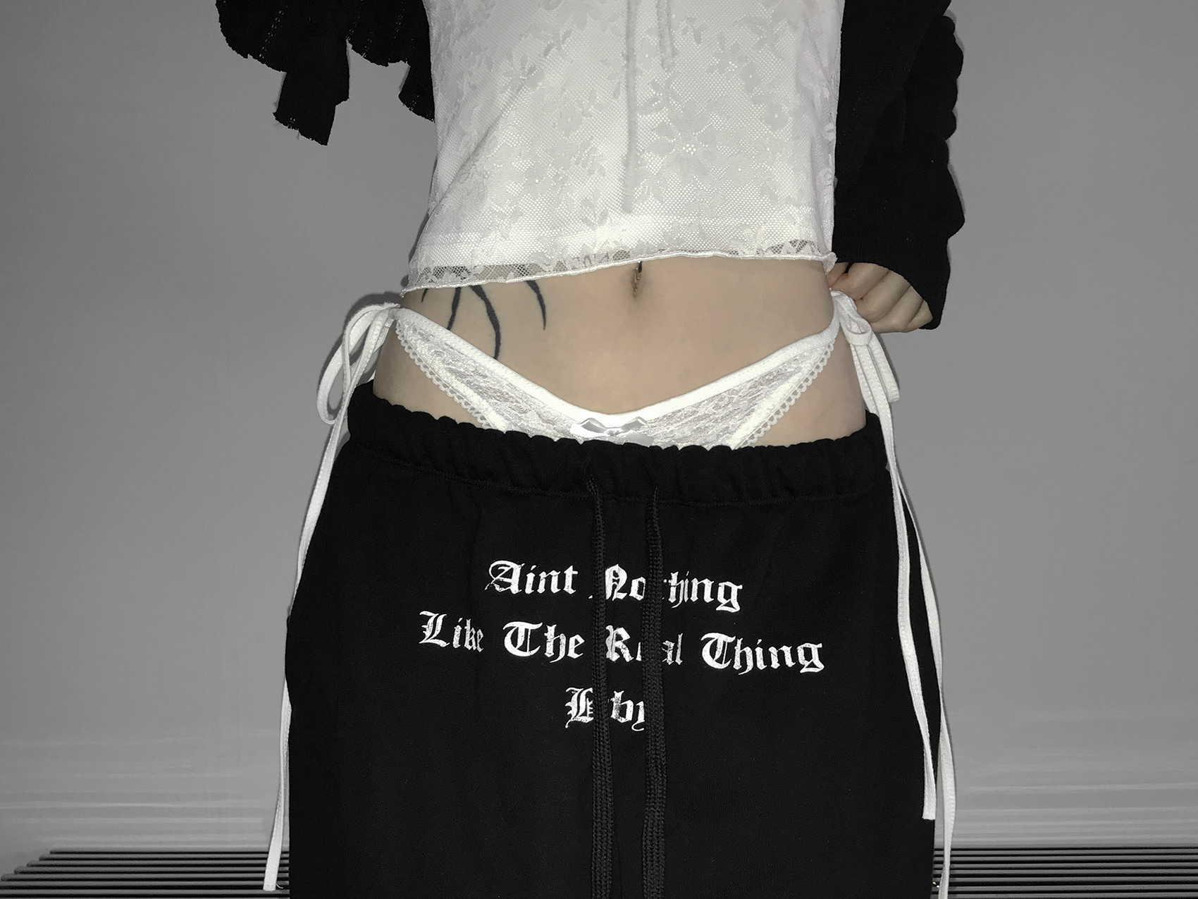 Layered Lace Waist Graphic Wide Leg Pants