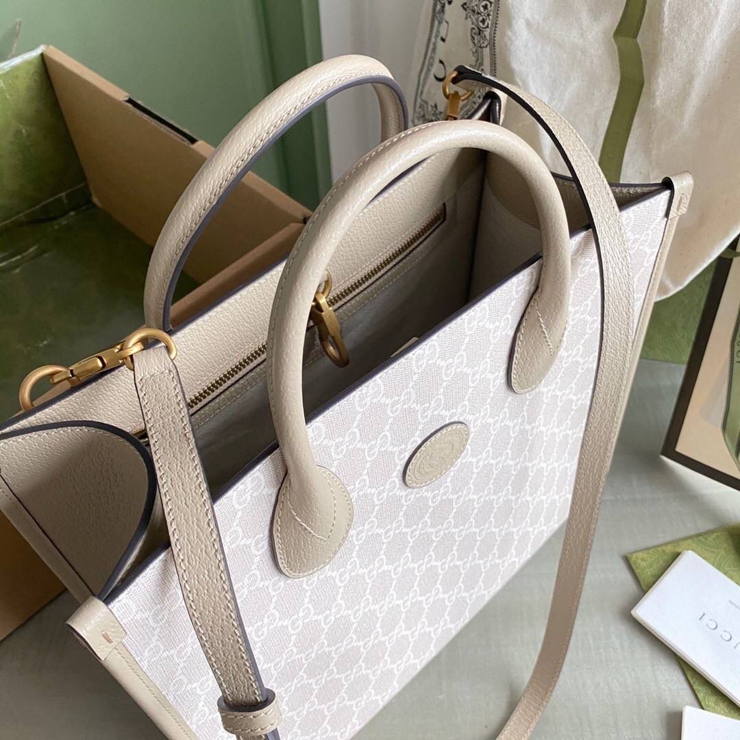 👜独家特级正品 g 659983 这款结构挺括的小号托特包采用gg supreme帆布制作，搭配燕麦色皮革滚边， 提供顶部提手和肩带双重携带选择。米色白色gg supreme帆布，环保材料，饰燕麦色皮革滚边❤️