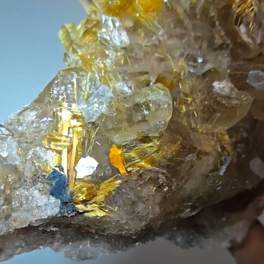 High-grade golden starburst rutiles on black hematite in quartz - RT1434
