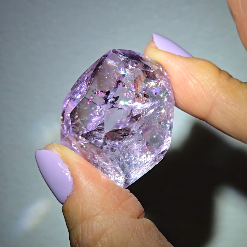 Amethyst pocket stone with rainbows and clarity - AM67