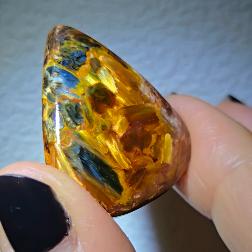 Red, gold, and blue pietersite cabochon - PT10