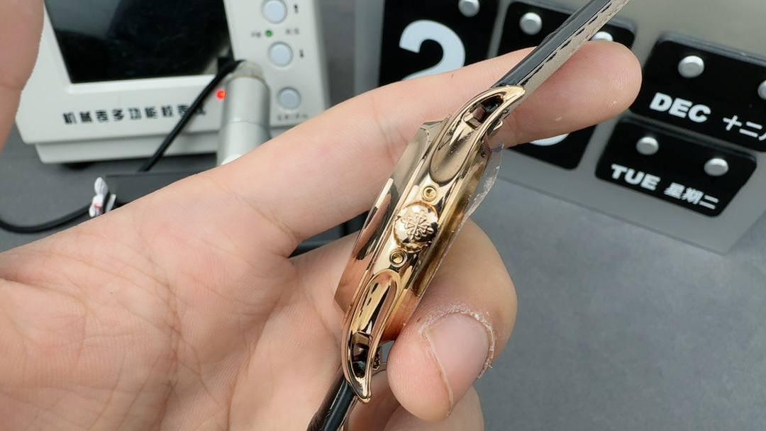 百达翡丽复杂功能时计系列男士腕表，月相显示，玫瑰金表壳，黑色表盘