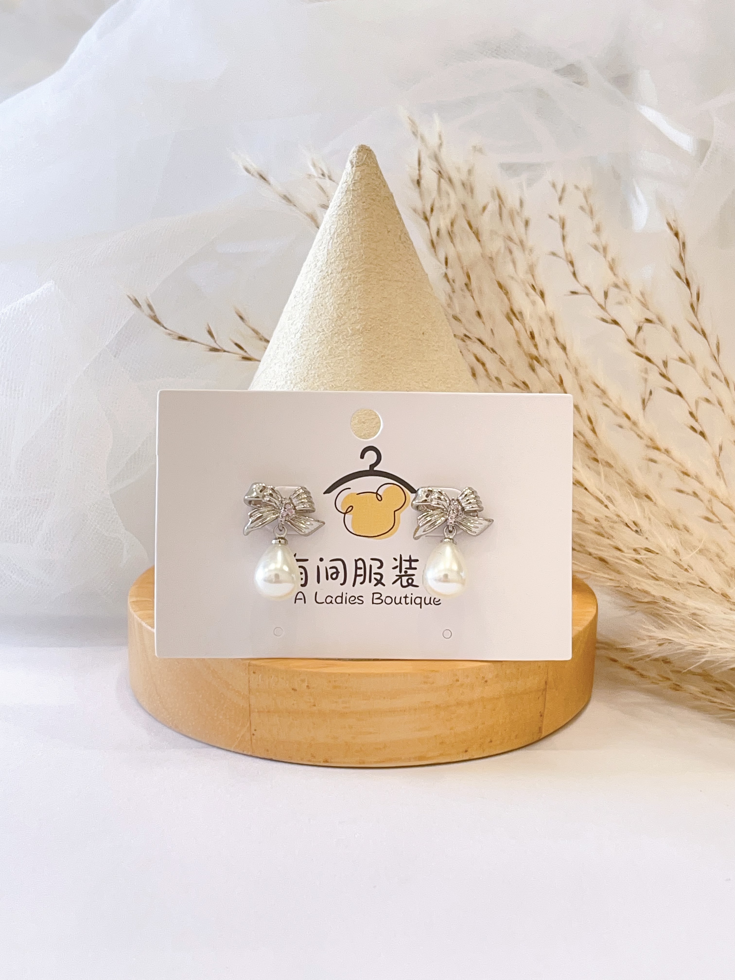 纹路蝴蝶结水滴珍珠耳环