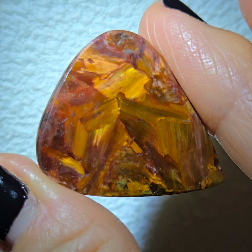 Red, gold, and blue pietersite cabochon - PT10