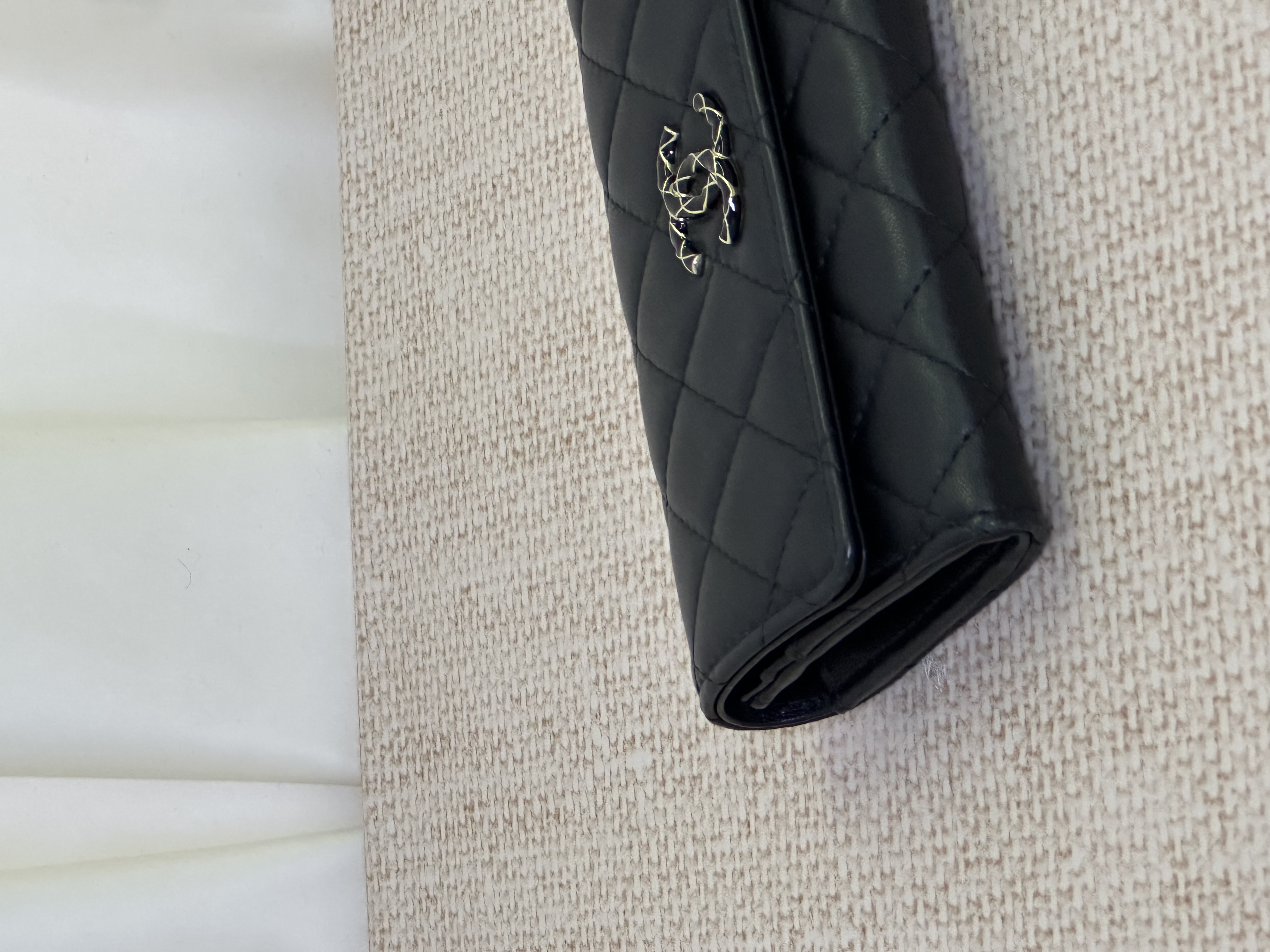 Pre owned Chanel black quilted flap wallet / Product Code: 26031024