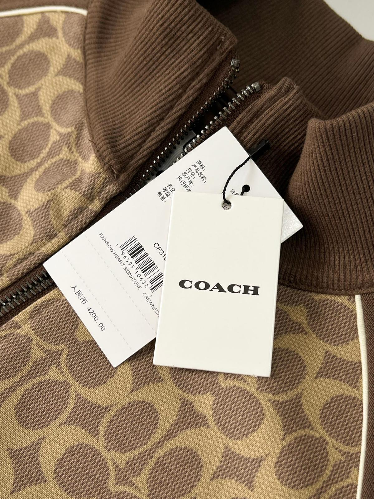 $280件。 C×oach 立領滿印拼接外套