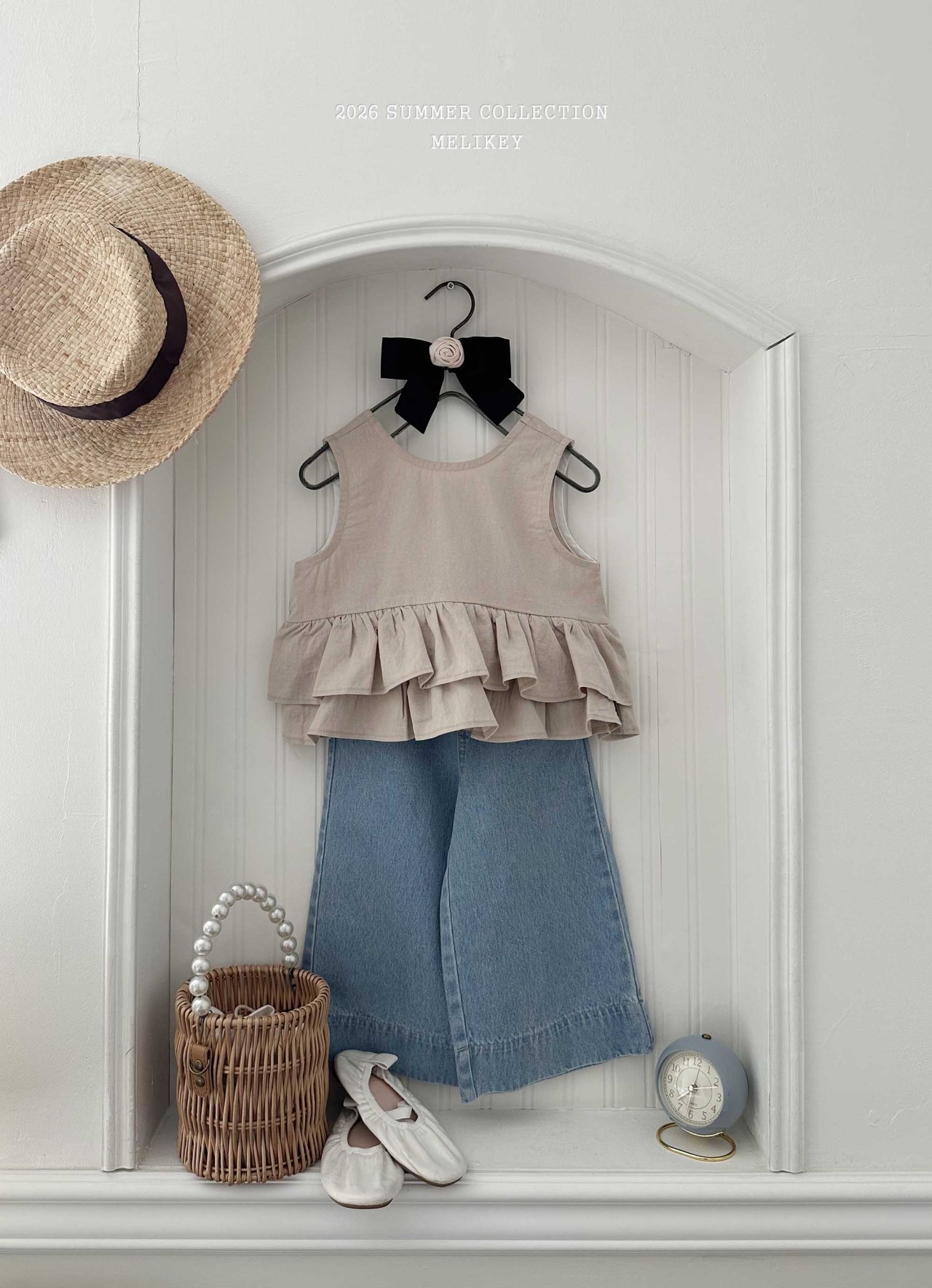 Ribbon Tiered Sleeveless Blouse