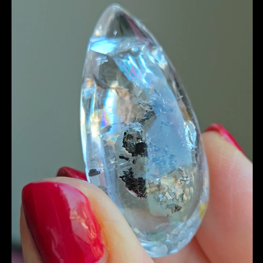 Enhydro cabochon with big bubble and carbon - EN4