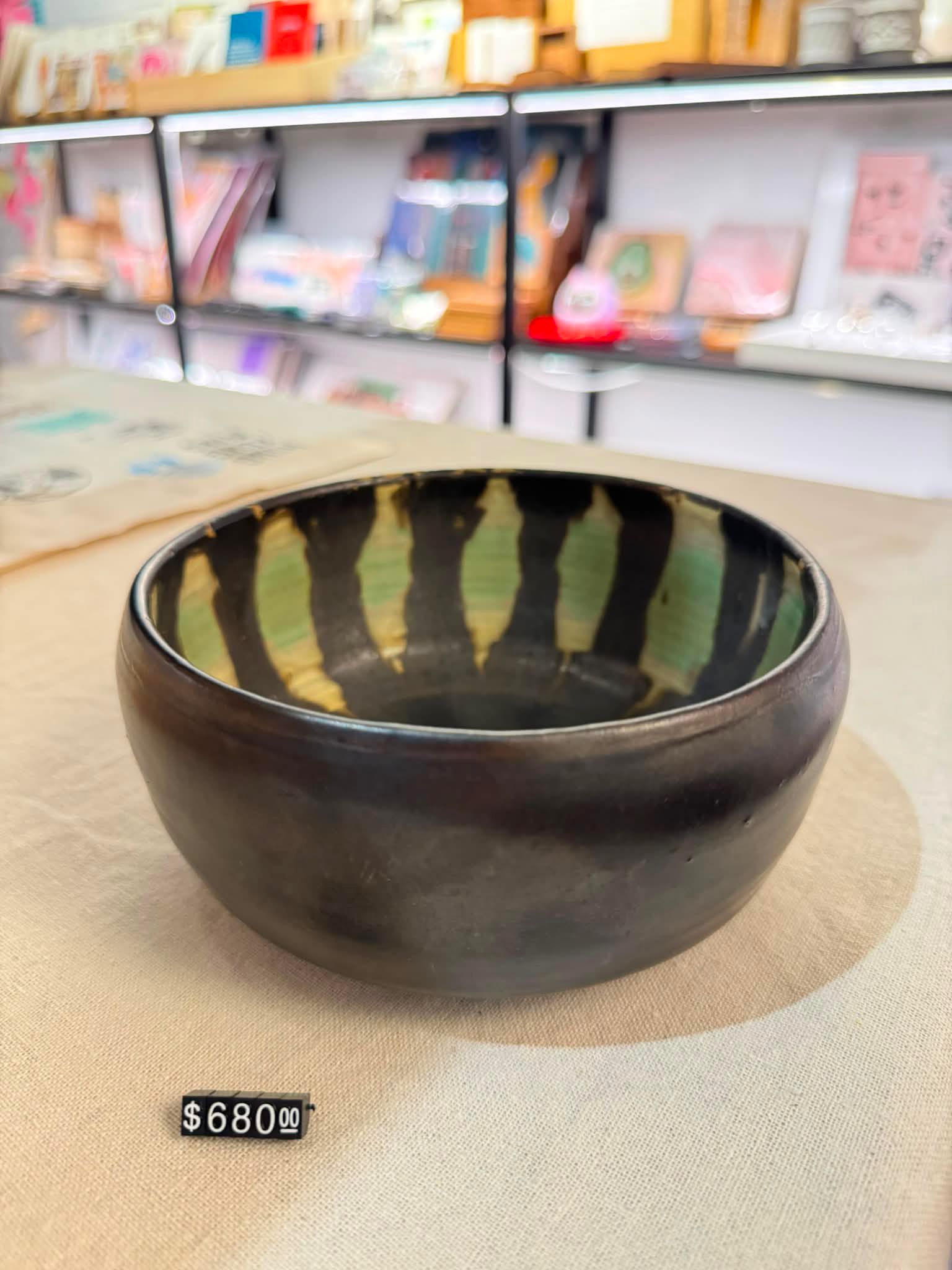 Carrie Ho - Artisan Black Ceramic Bowl with Green and Gold Striped Interior