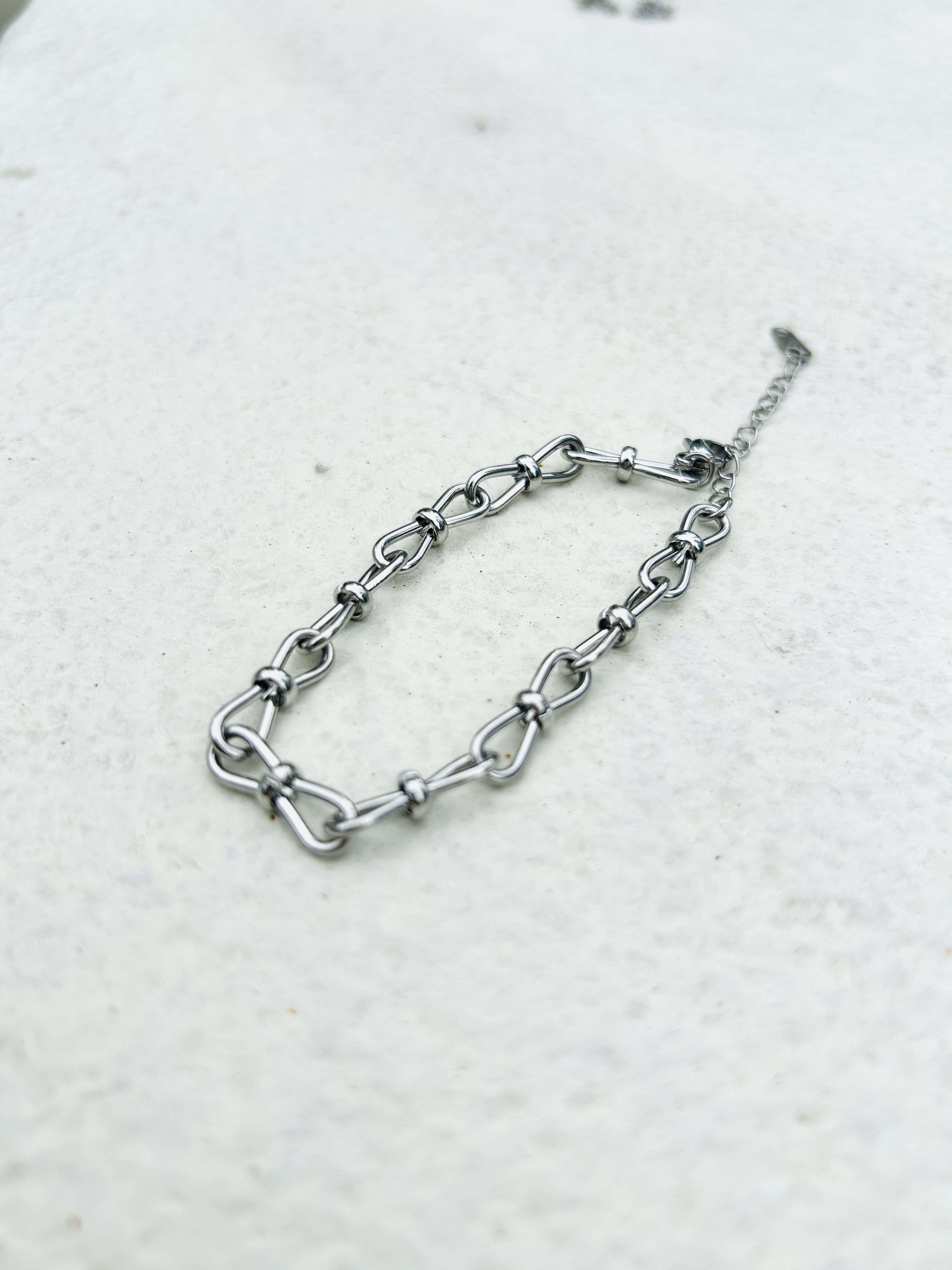 Silver bow stainless bracelet