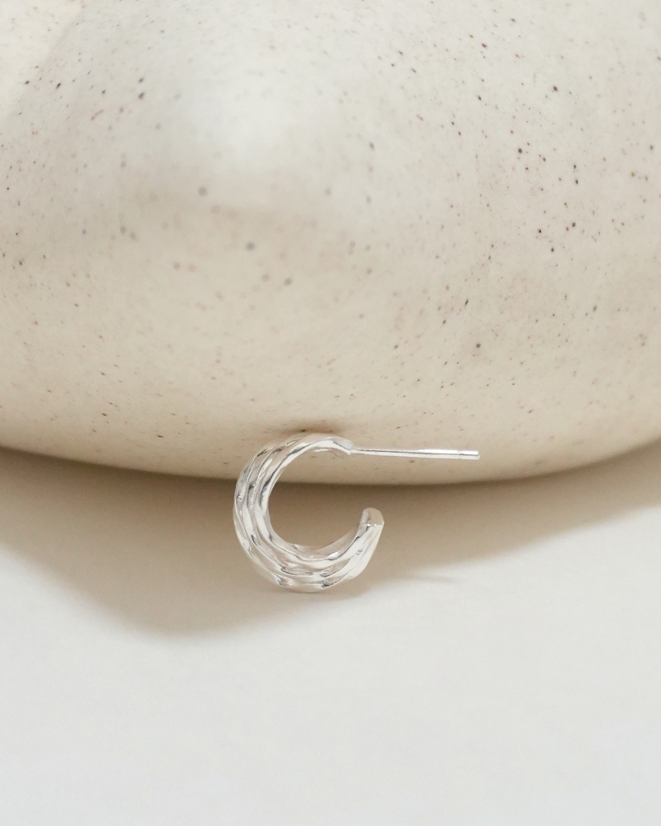 Rhythmic Lunar Twist Hoops