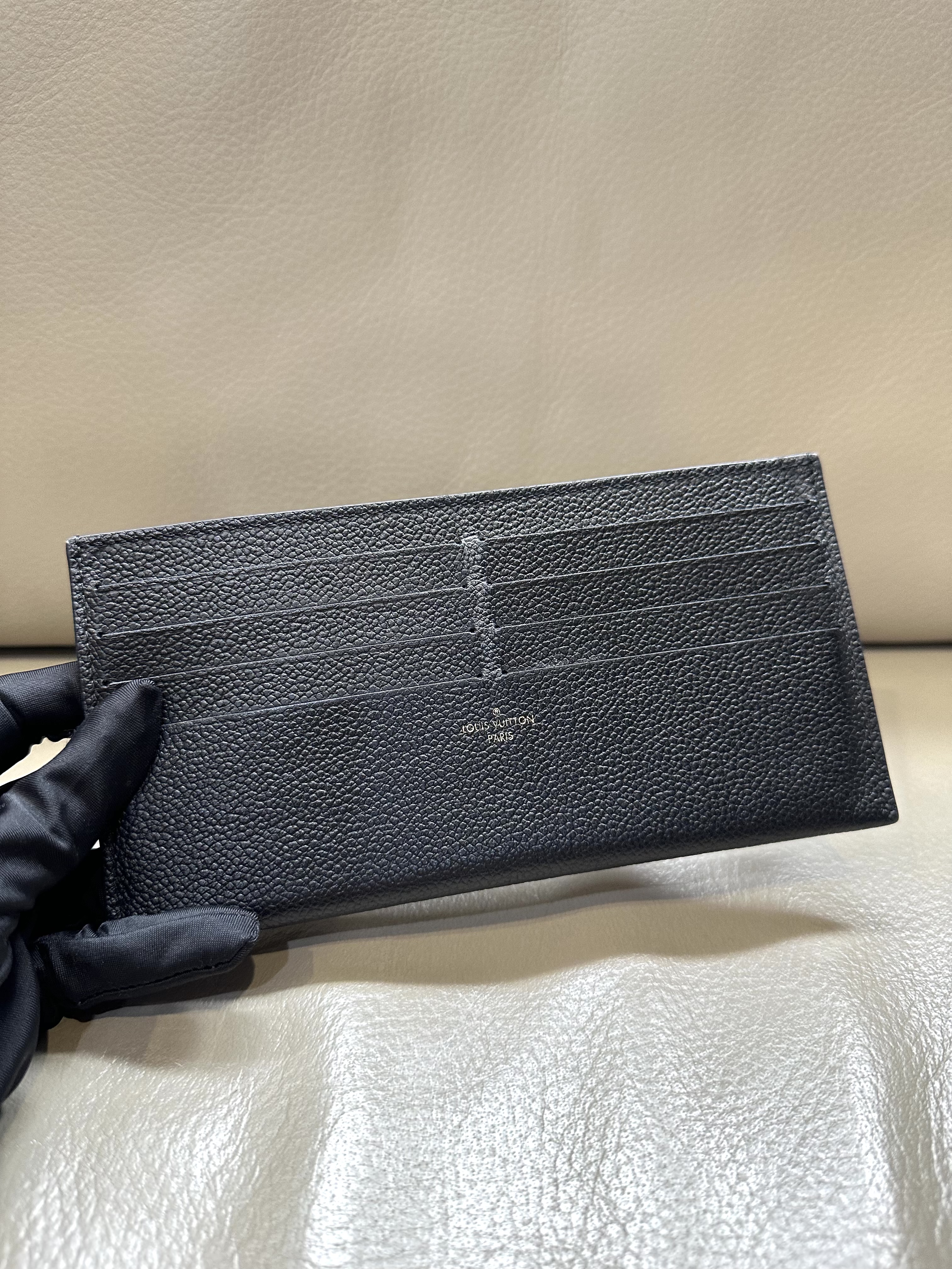 Pre-owned LV Félicie Pochette in bicolor Monogram Empreinte leather / Product Code: 26040508