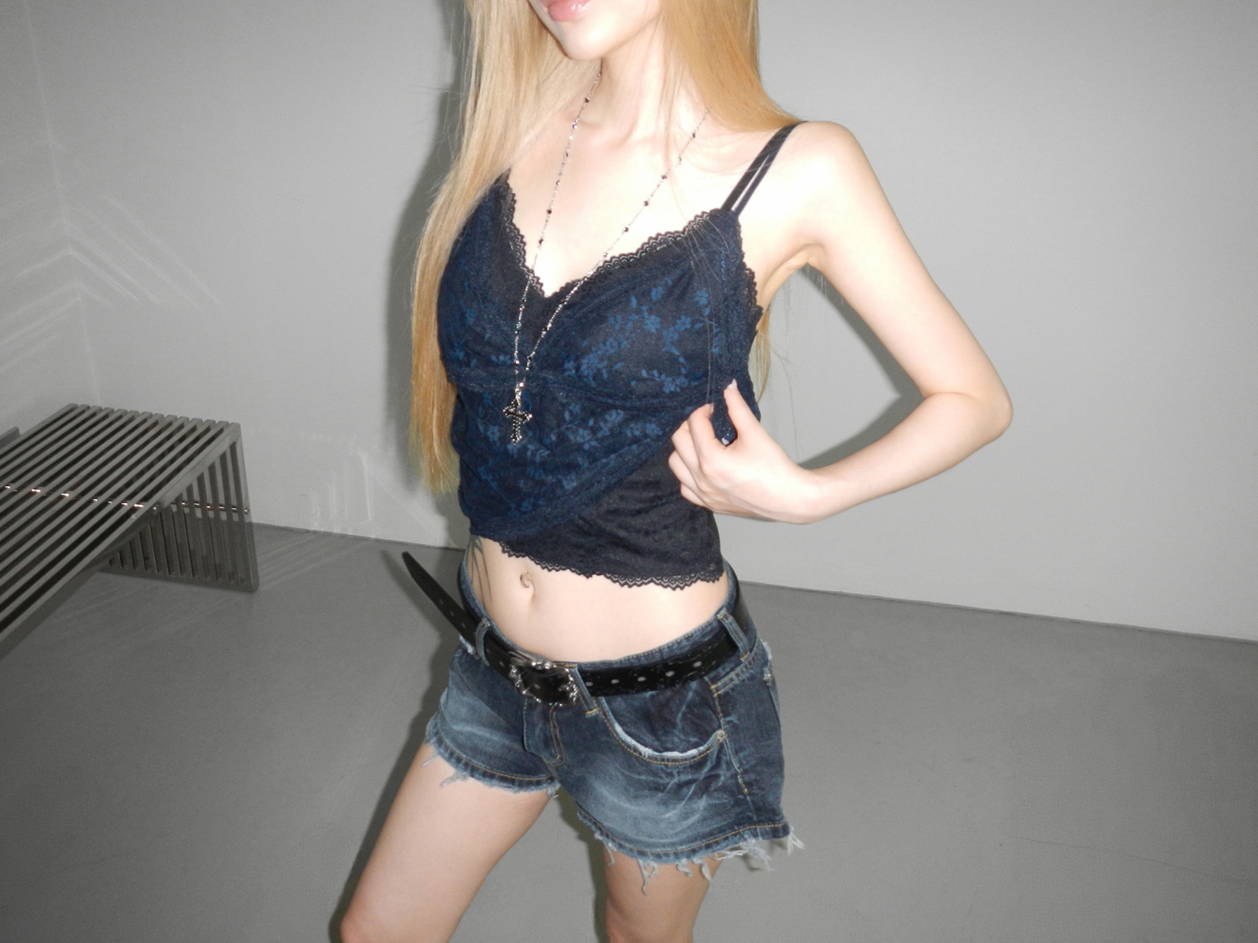 Low-Rise Distressed Denim Shorts