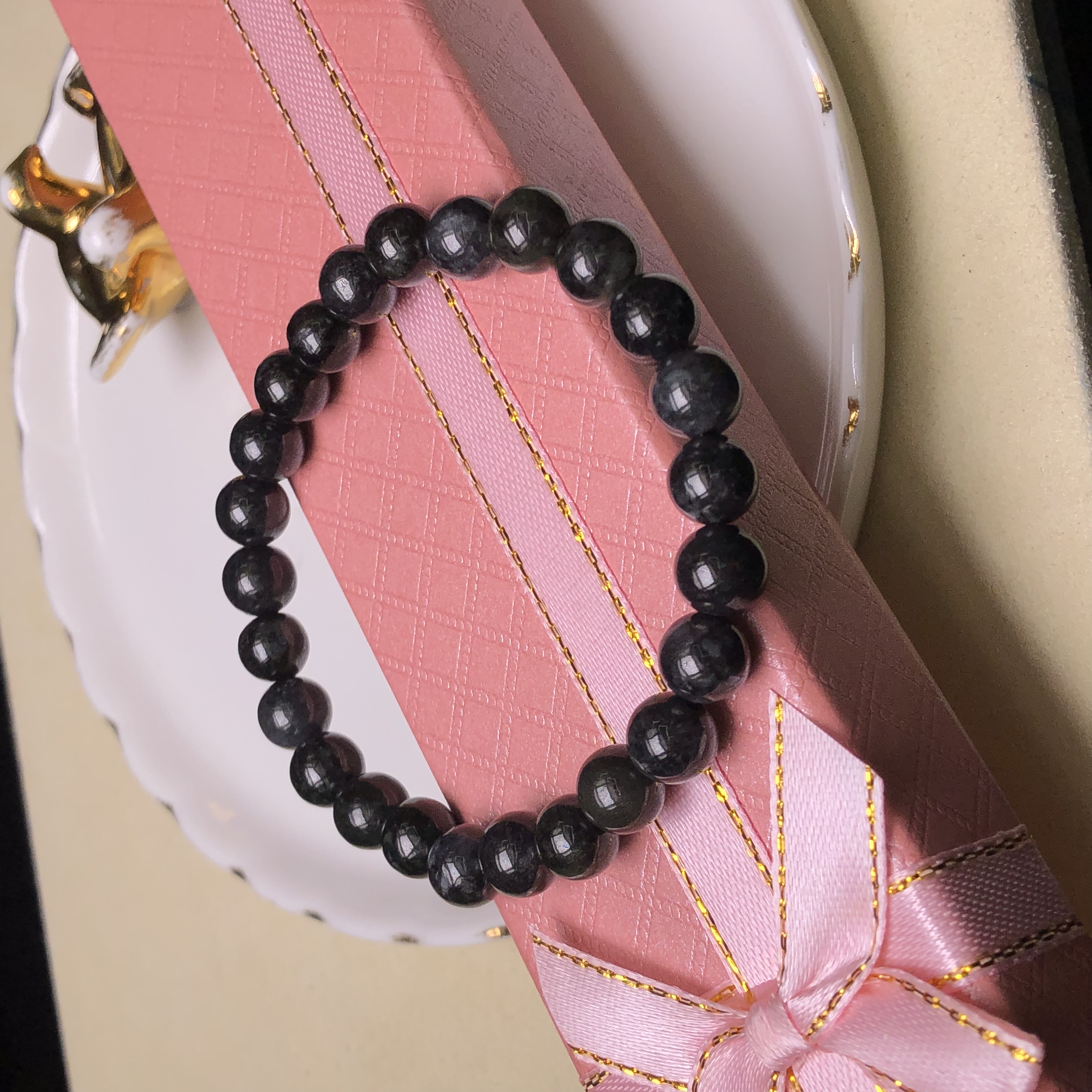 CA00686 7.6mm烏雞手串
