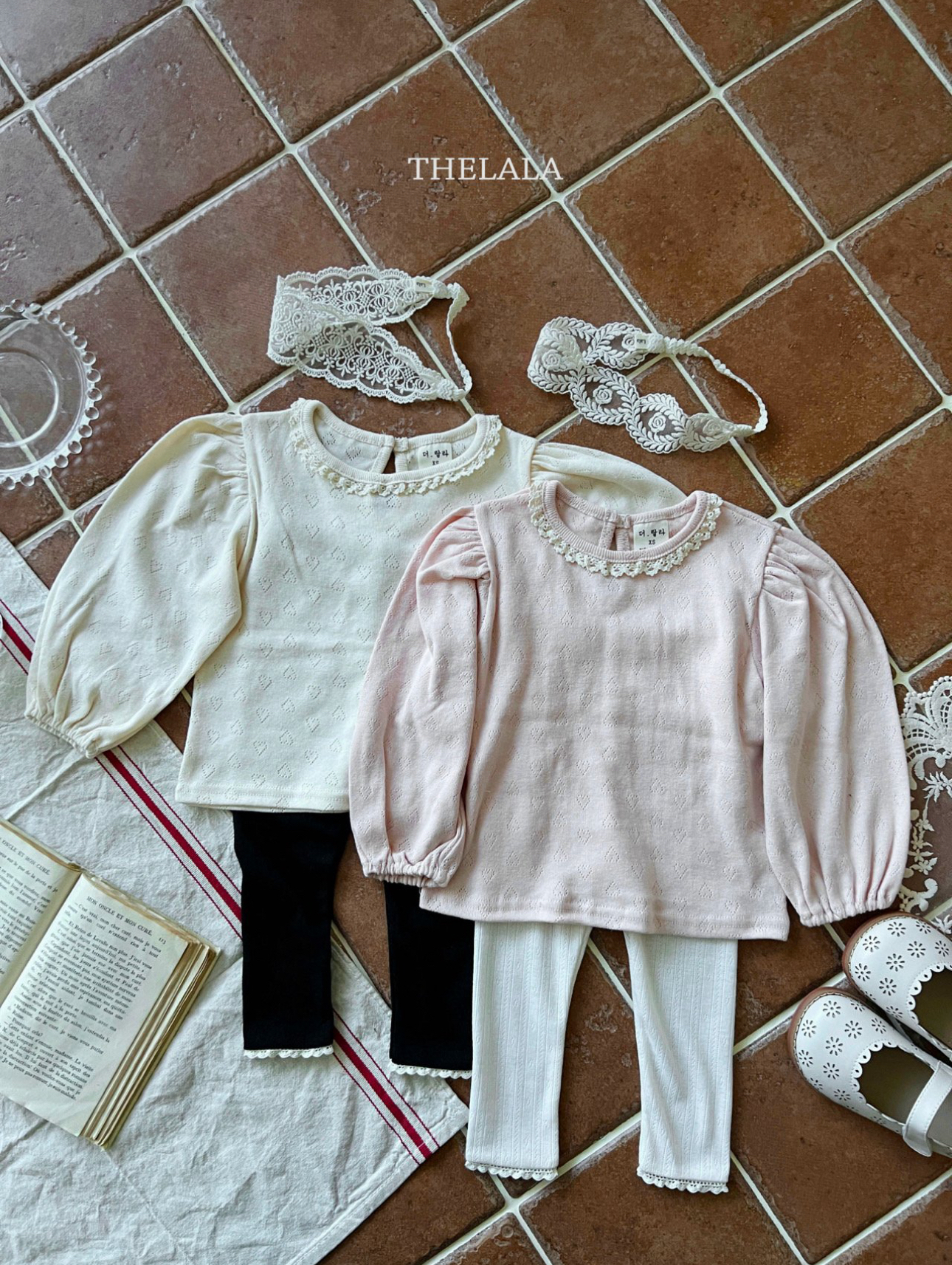 🌸預訂 韓國直送🌸🇰🇷THELALA兩色蕾絲心心通花泡泡長袖上衣