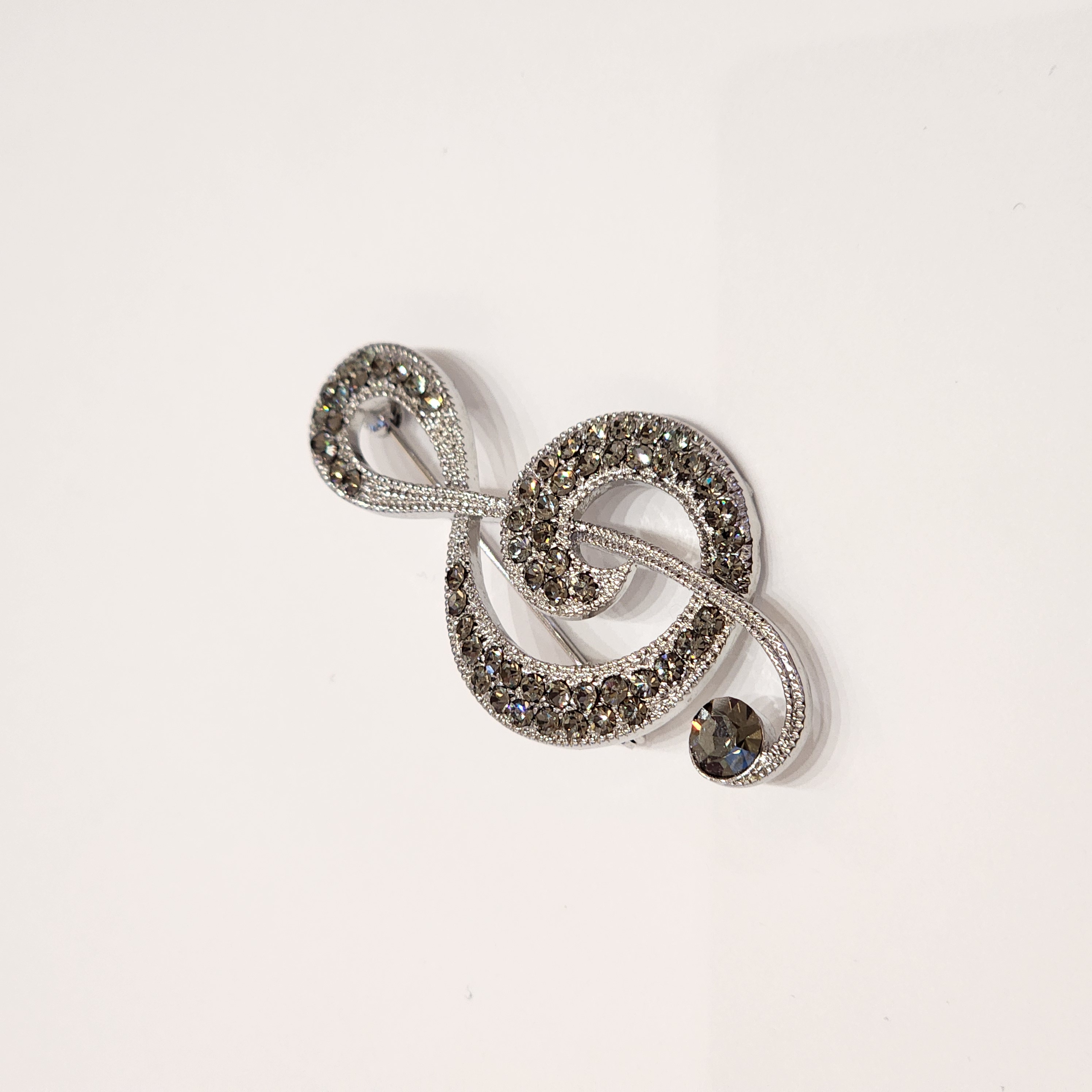 SWAROVSKI STONE TREBLE CLEF BROOCH