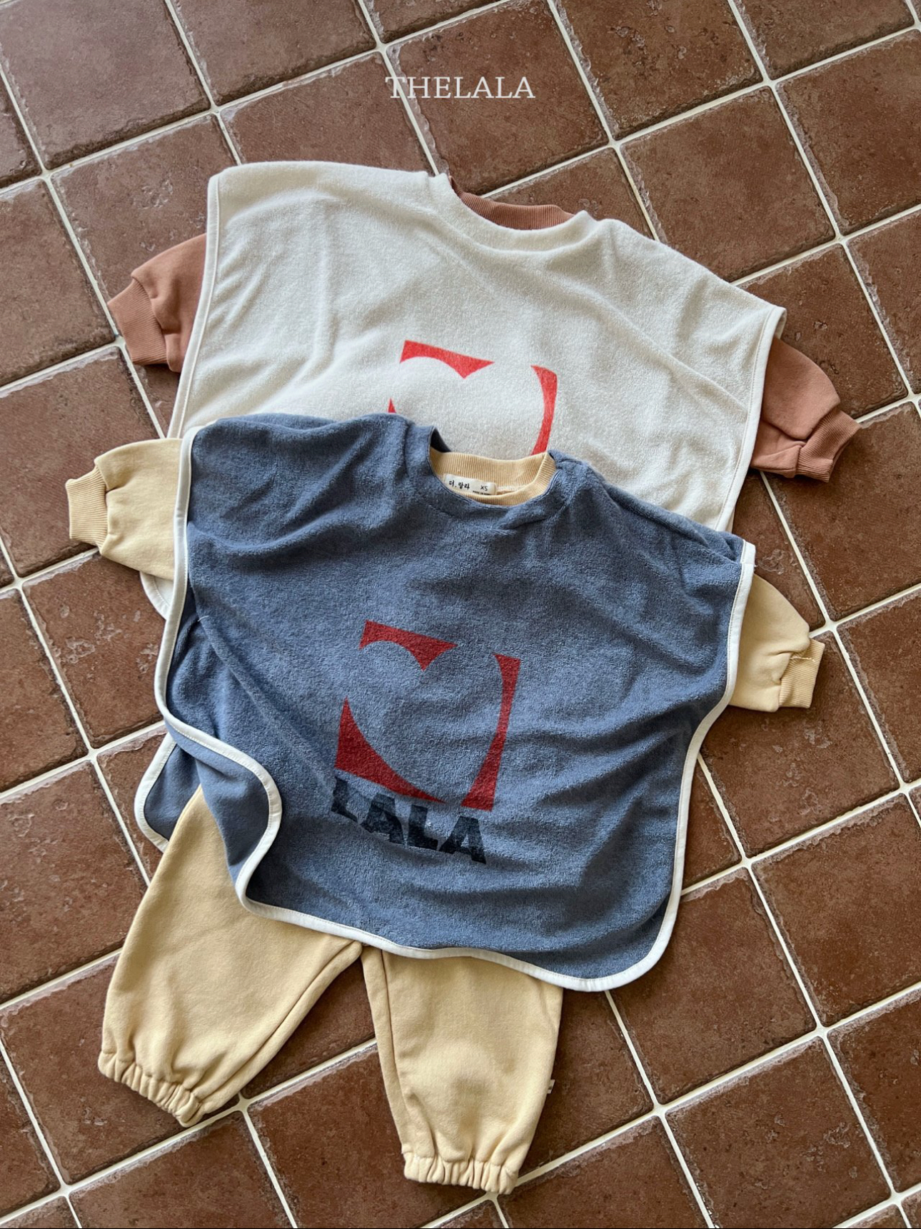 🌸預訂 韓國直送🌸🇰🇷THELALA兩色愛心標誌印花寬鬆背心